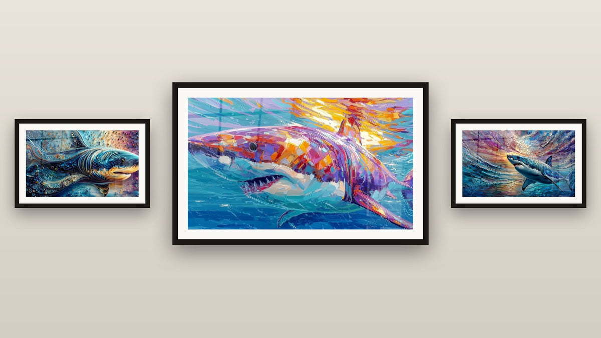 Gallery wall with three framed paintings: Colorful Shark, Megalodon Stylized and Megalodon Shark