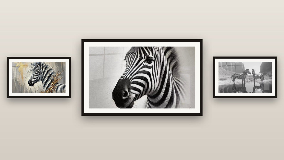 Gallery wall with three framed paintings: Zebra Serenity Monochrome, Golden Stripes and Simplicity Striped