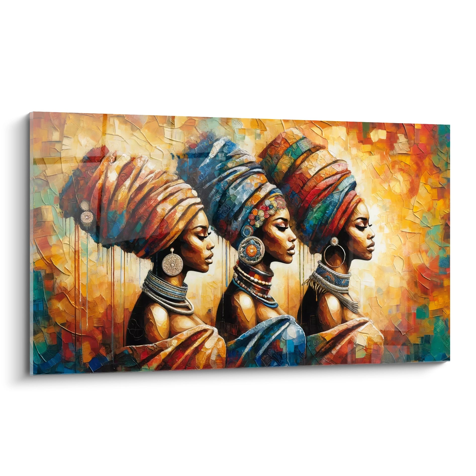 Vue de biais du tableau africain avec ses trois figures féminines majestueuses. Les couleurs chaudes de marron, orange et bleu créent une ambiance vibrante, capturant la richesse des traditions africaines.