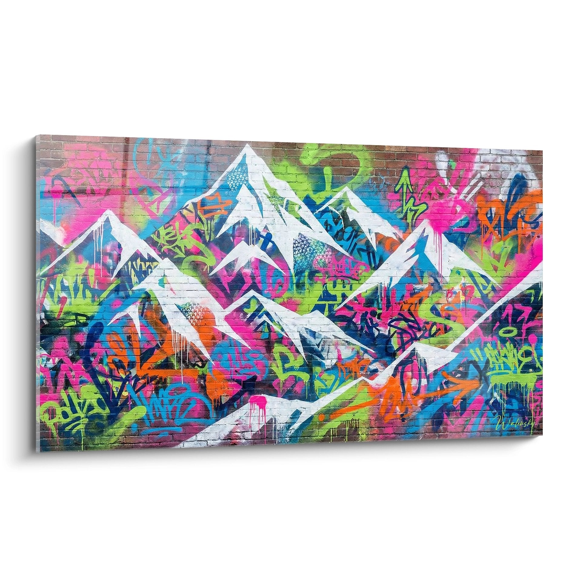 Colorful street art canvas with white mountains on brick wall and multicolor graffiti