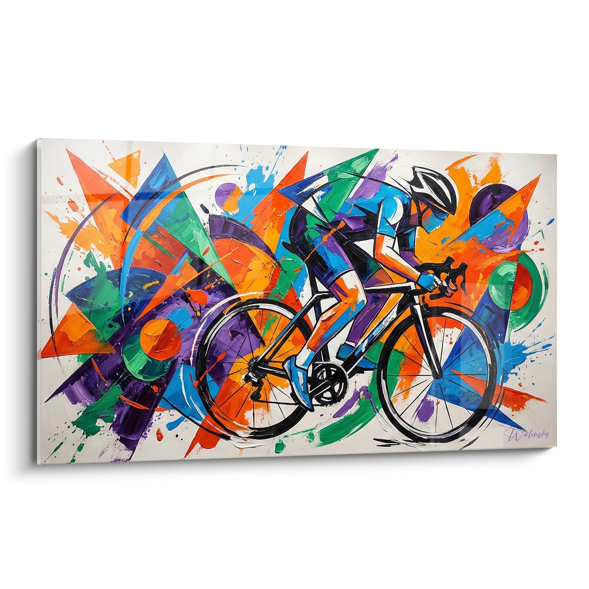 Tableau mural abstrait coloré représentant un cycliste VTT avec explosion de formes géométriques oranges bleues vertes