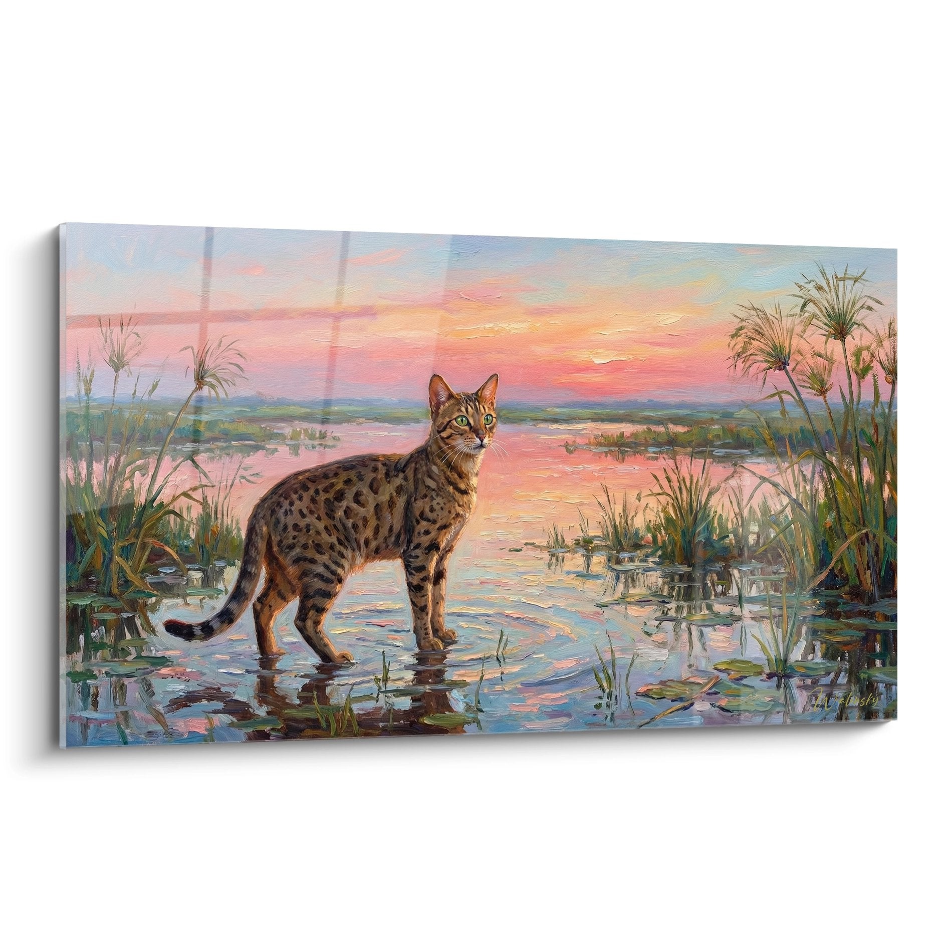 Egyptian Mau spotted cat painting by the water at sunset with golden reflections and reeds