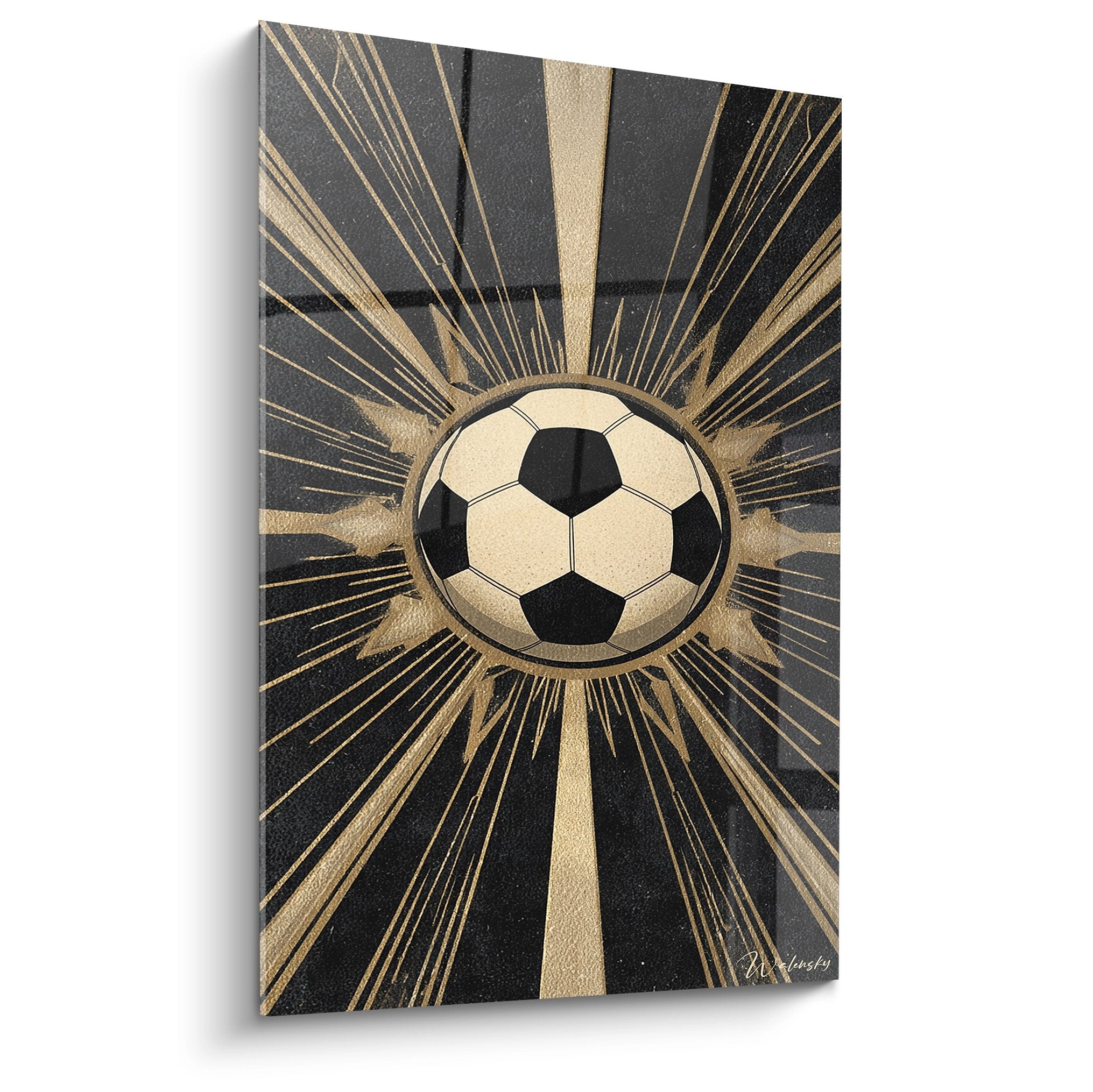 Tableau football moderne avec ballon noir et blanc entouré de rayons dorés sur fond noir