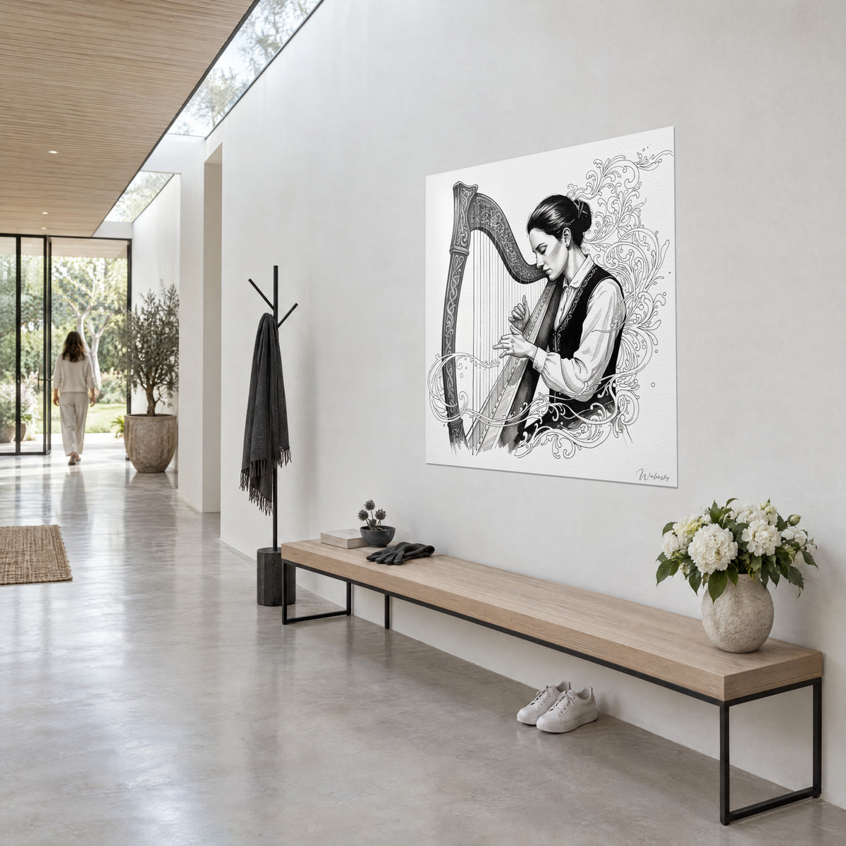 Wall art of a Celtic musician in a black embroidered waistcoat, grey ink swirls on white background, hung in an architect's hallway