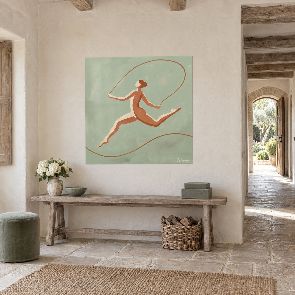 Quadro di una ballerina in spaccata aerea, sagoma in terracotta e crema su sfondo verde acqua, nell'ingresso di una casa in pietra