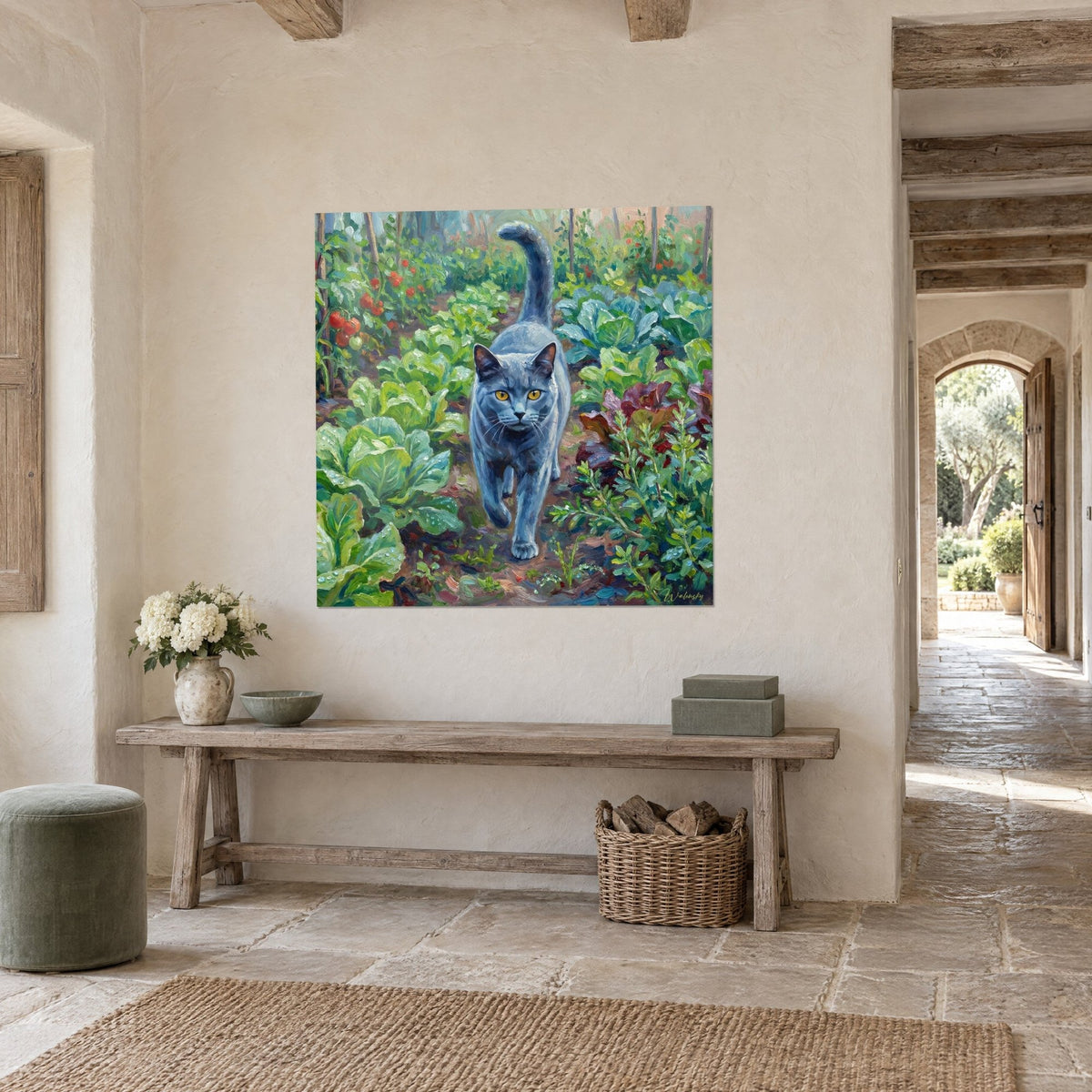 Wall art slate-blue cat with tail held high, morning stroll through a green and red vegetable garden, on a beige rendered wall of a stone house
