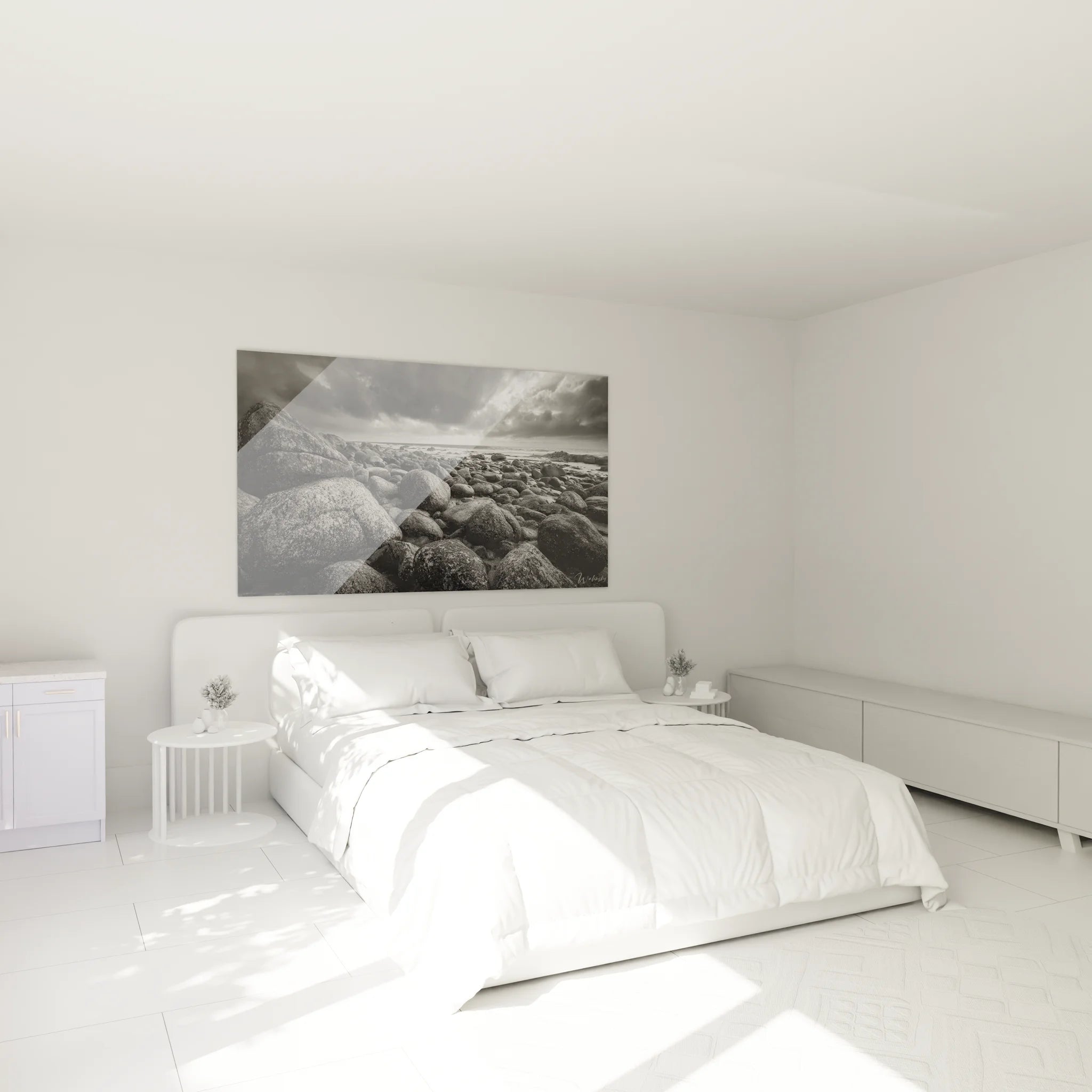 Décoration chambre avec tableau de galets côtiers en noir et blanc ambiance apaisante