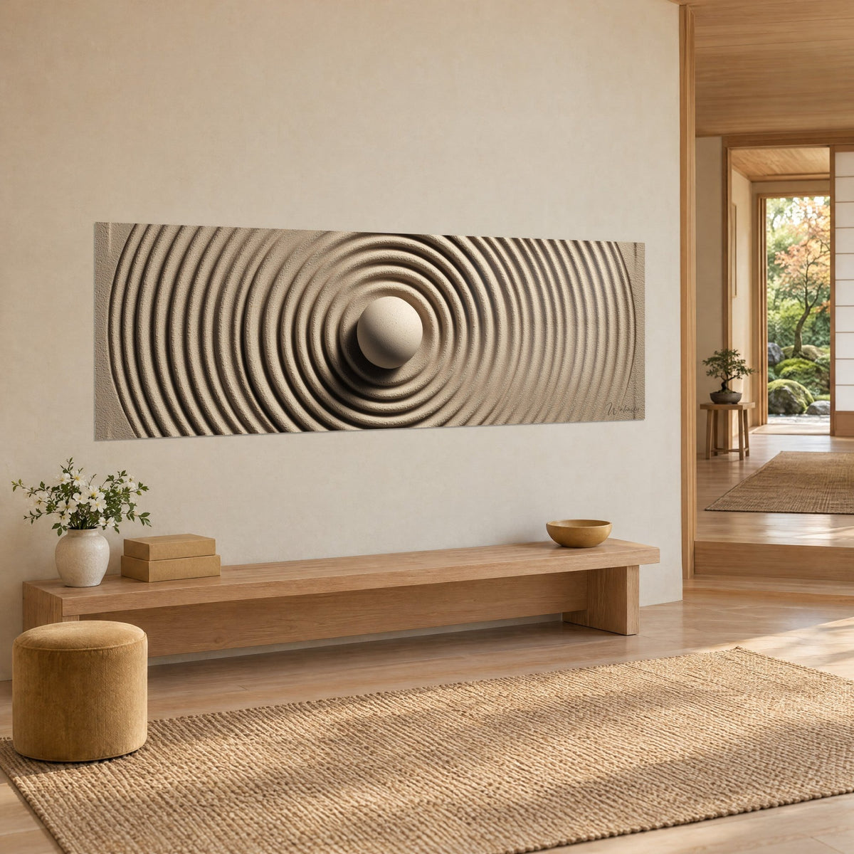 Wall art with an organic vortex, concentric rings of ochre and taupe sand around an ivory sphere, Japandi three-quarter view