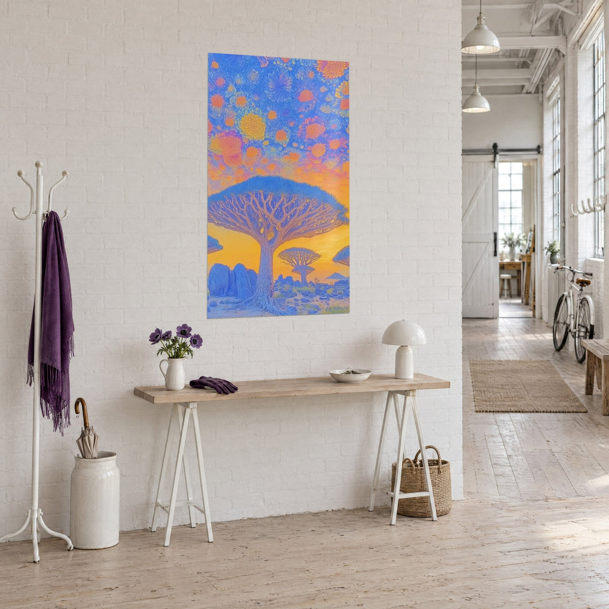 Wall art umbrella acacia with pink branches against an amber dusk, hung in a loft with white brick walls