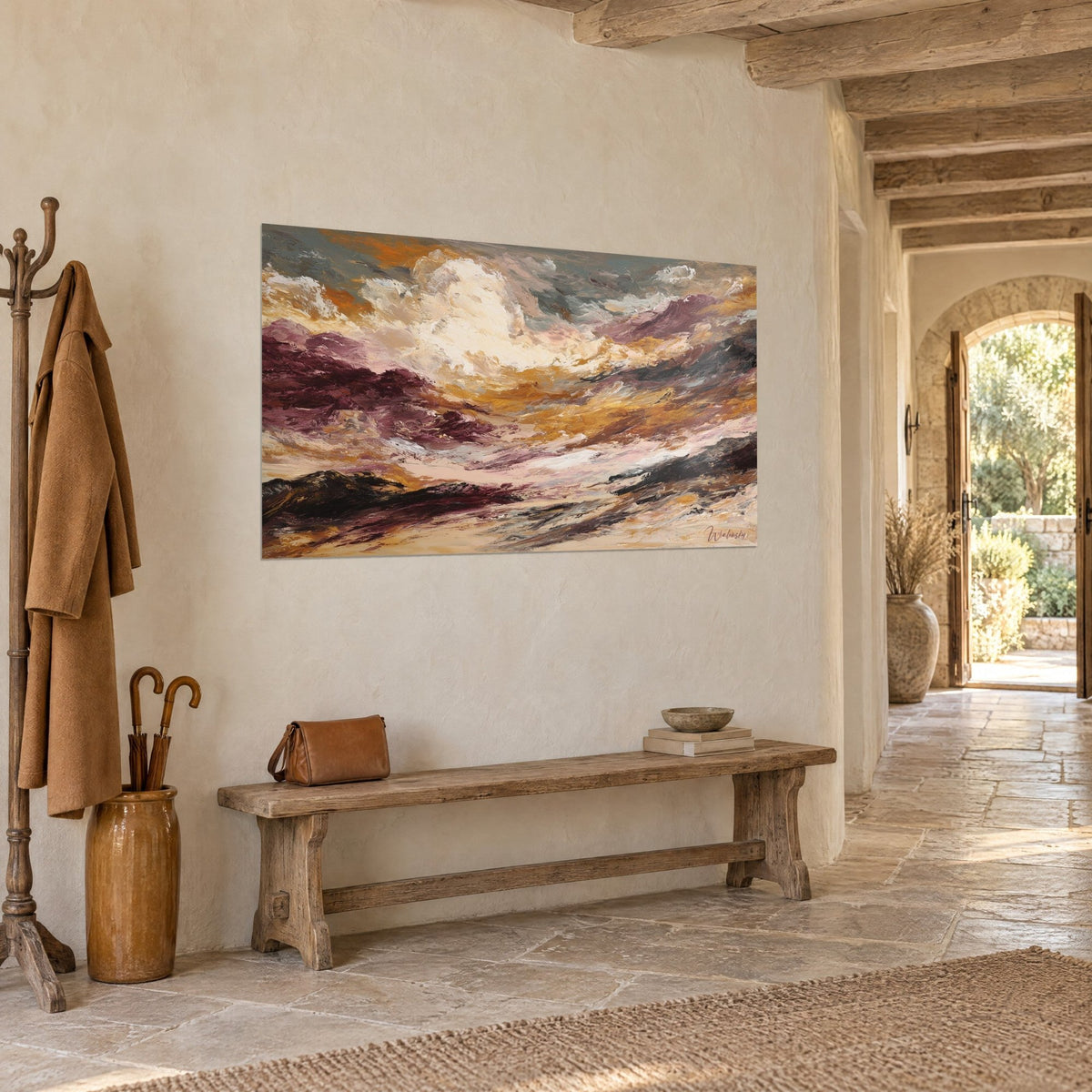 Wall art of an abstract stormy sky with ochre and plum palette-knife strokes, rough plaster wall, wooden bench, stone house