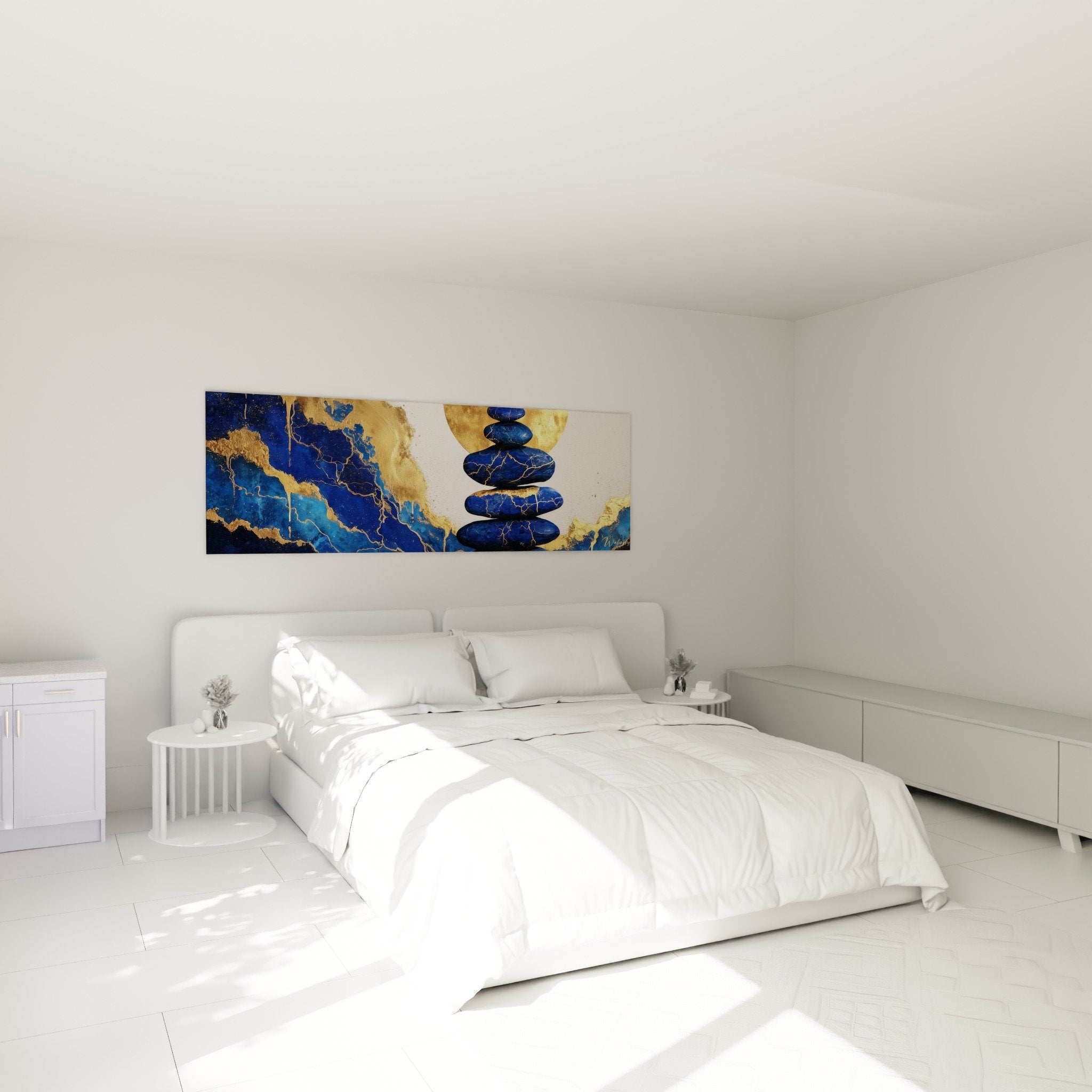 Blue balanced pebbles artwork with golden patterns in zen bedroom with white and natural tones