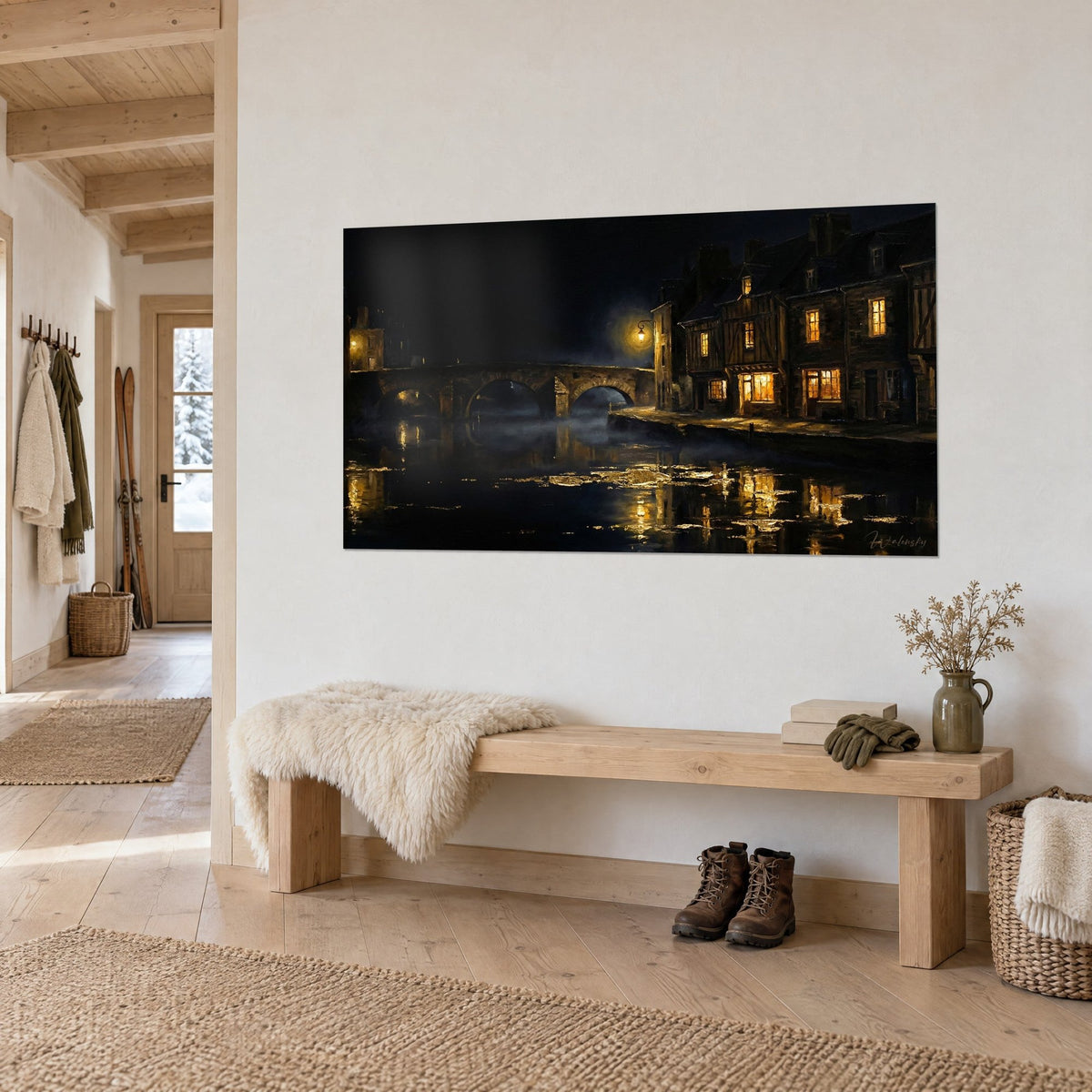 Wall art grey stone bridge over ink-dark water, yellow lamppost and orange windows, three-quarter view in a chalet