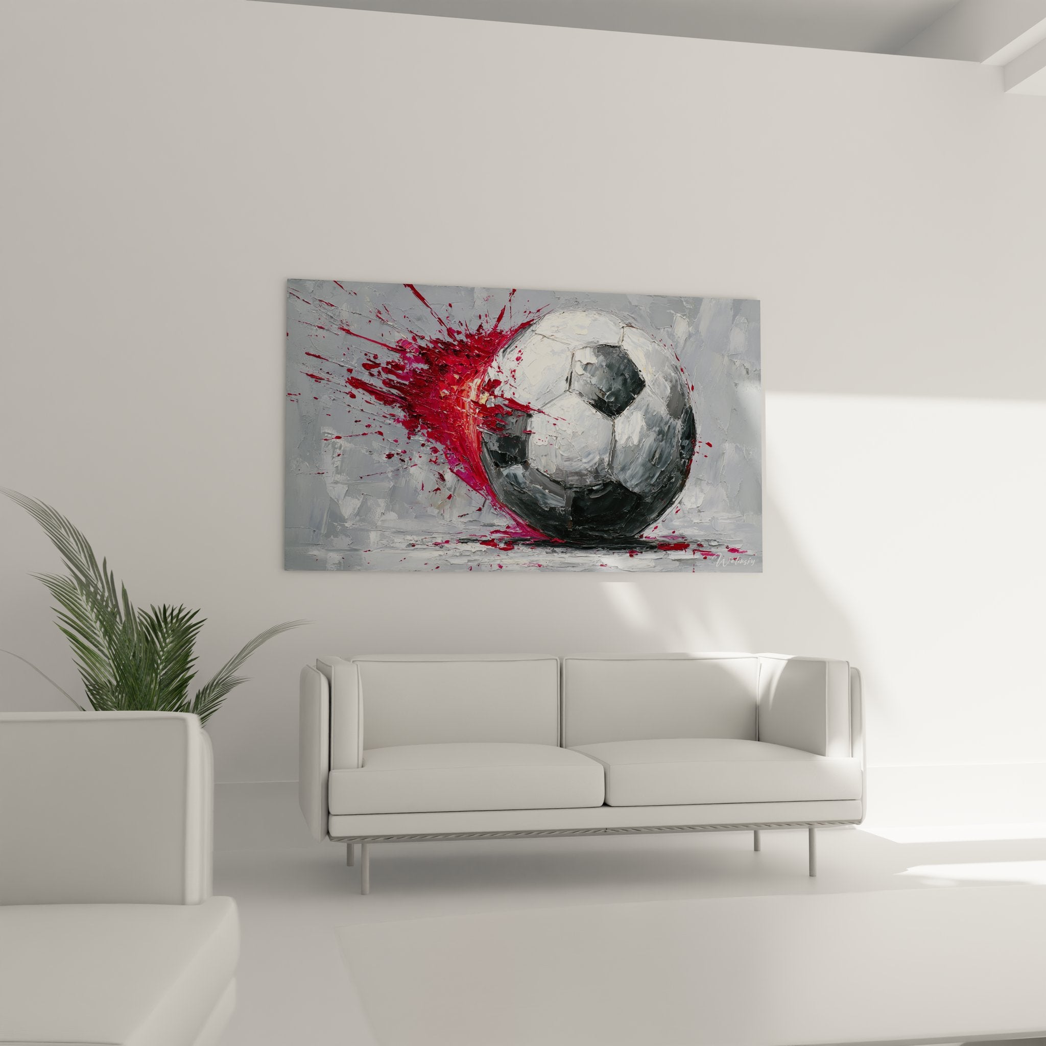 Détail rapproché ballon de football peint avec éclaboussures rouges et textures épaisses