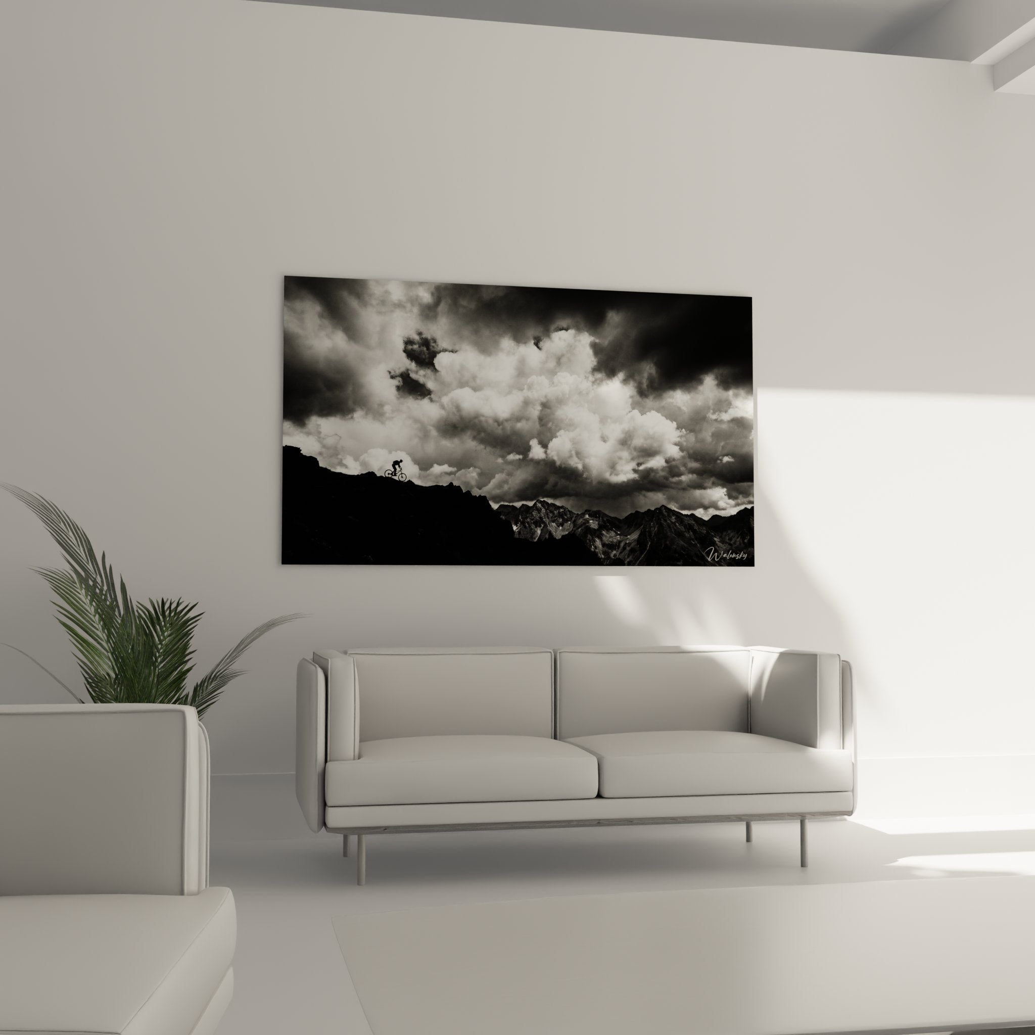 Close-up detail of mountain bike painting revealing cloud texture and contrasting silhouette of cyclist on alpine ridge