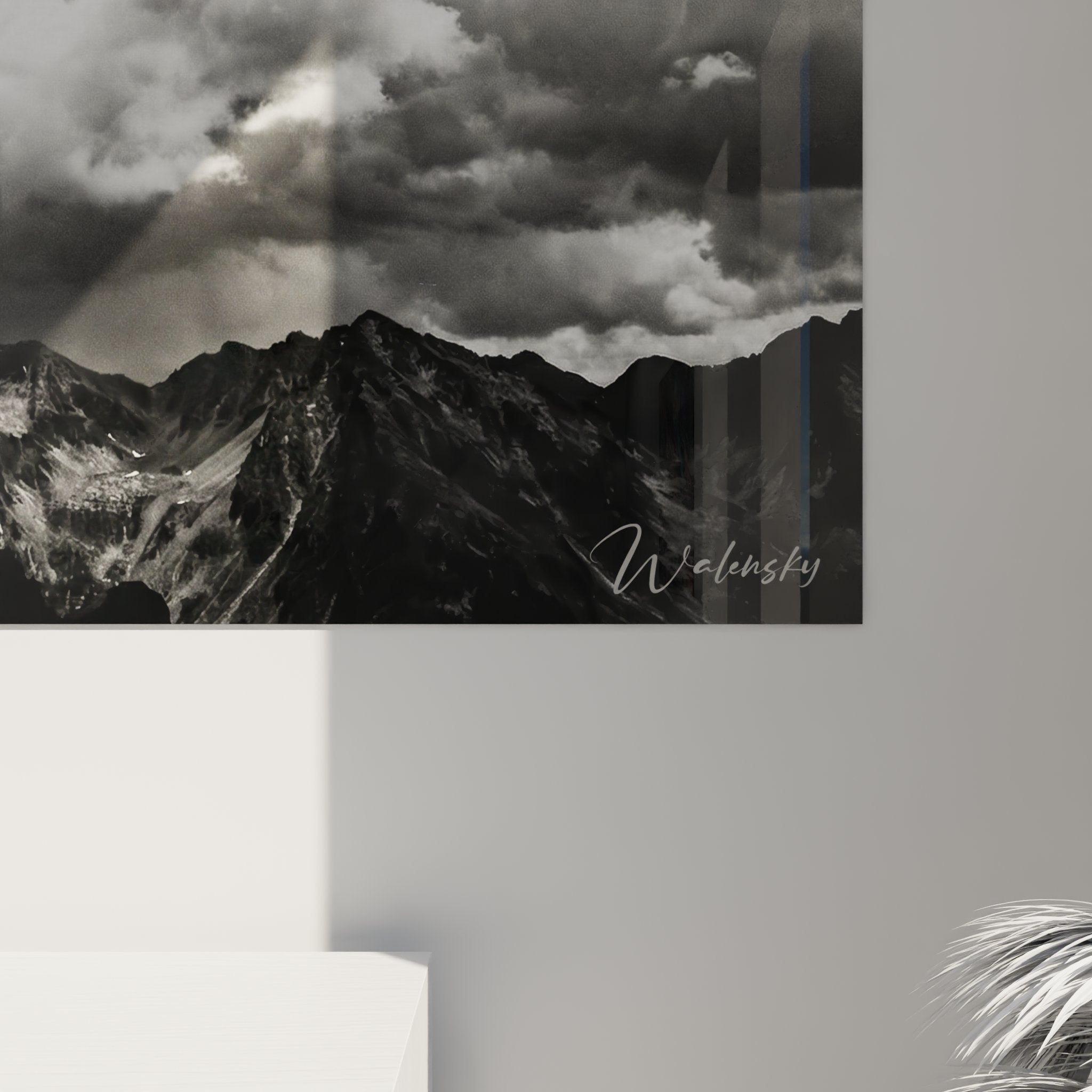 Overview of mountain bike wall artwork in contemporary interior, black and white alpine landscape ambiance