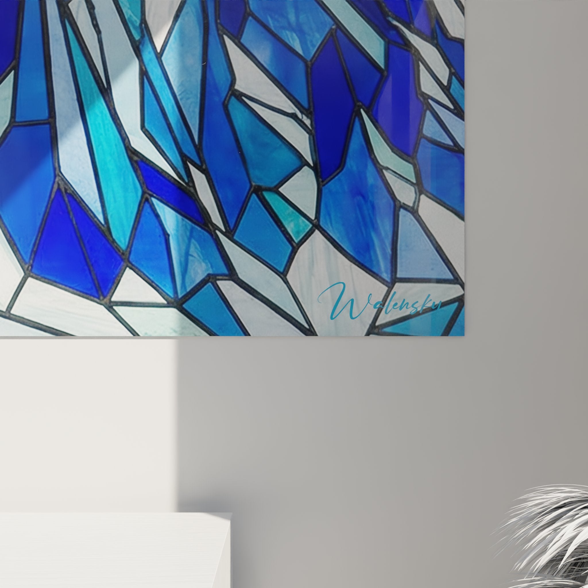 Overview of abstract mountain artwork with ice crystals in contemporary living room with alpine atmosphere