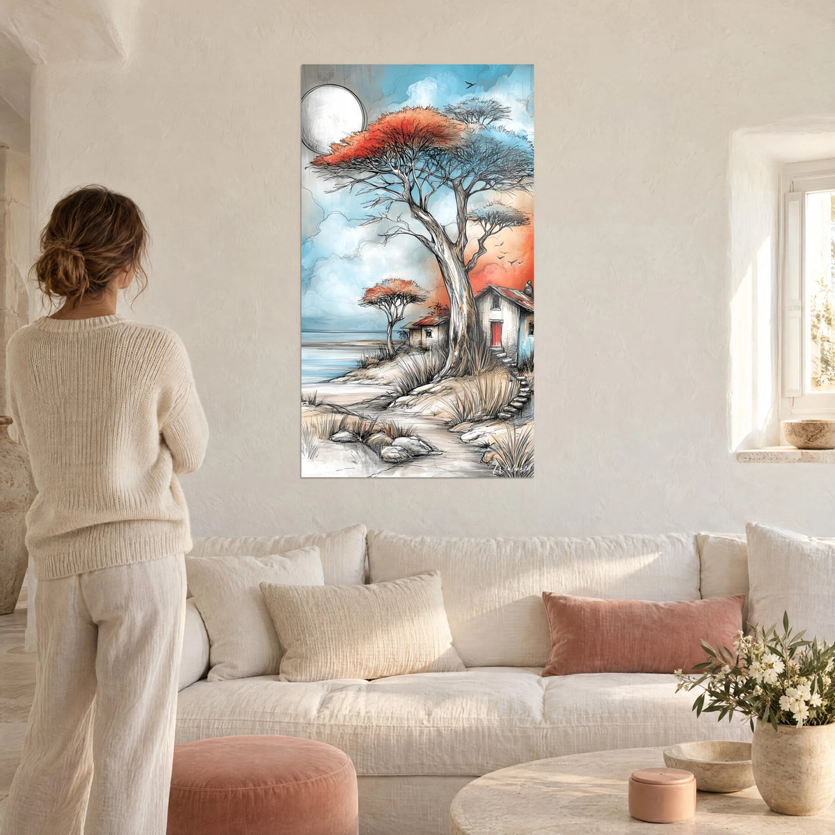 Tableau acacia à la canopée cuivrée, ciel bleu azur, cabane à porte rouge, au-dessus d'un canapé dans un salon lumineux