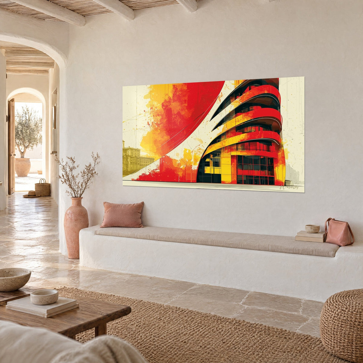 Tableau tour aux étages arrondis rouge vif et jaune, taches d'aquarelle orange, sur un mur crème d'une maison méditerranéenne