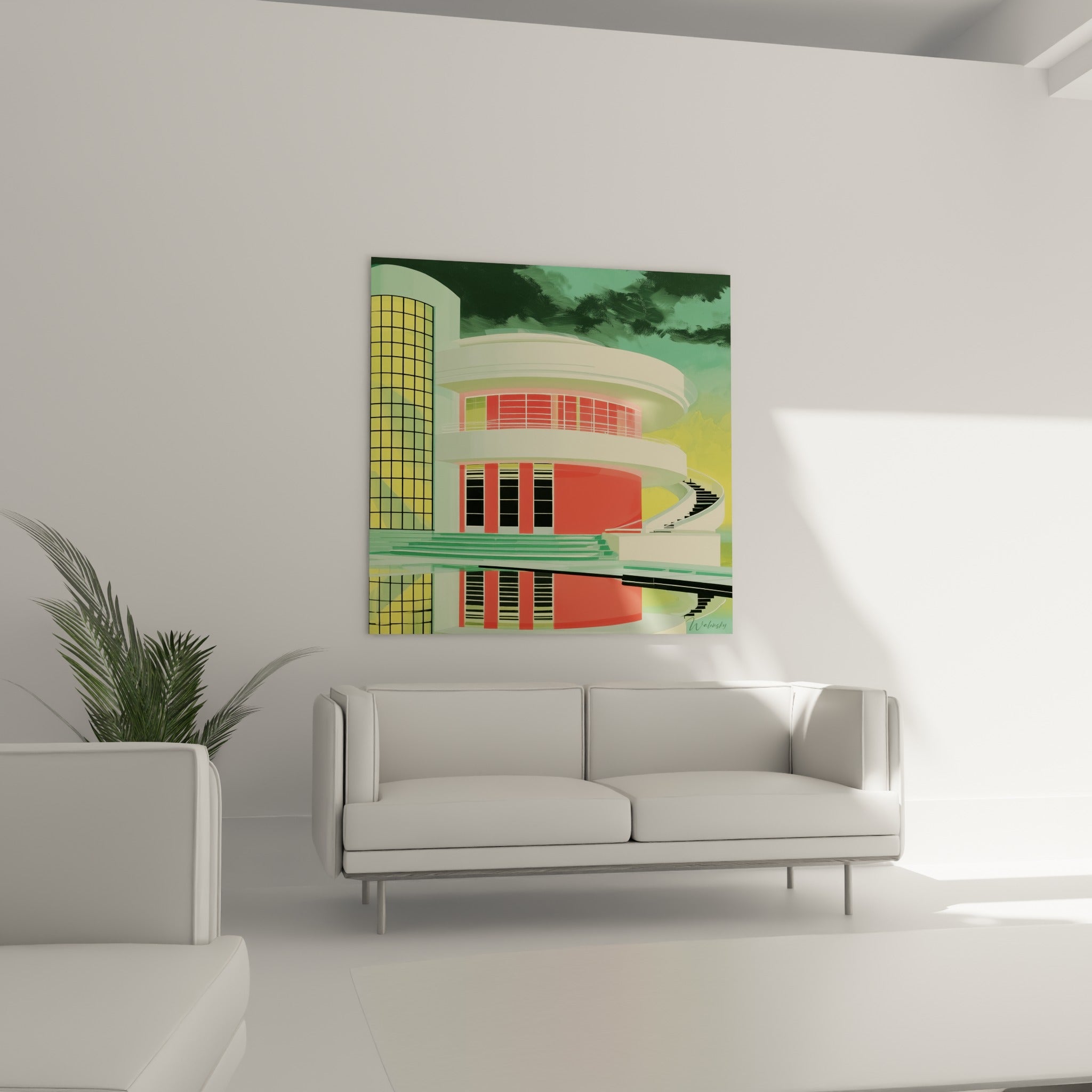 Édifice moderniste jaune et rouge à l'escalier noir en spirale, au-dessus d'un canapé dans un salon lumineux