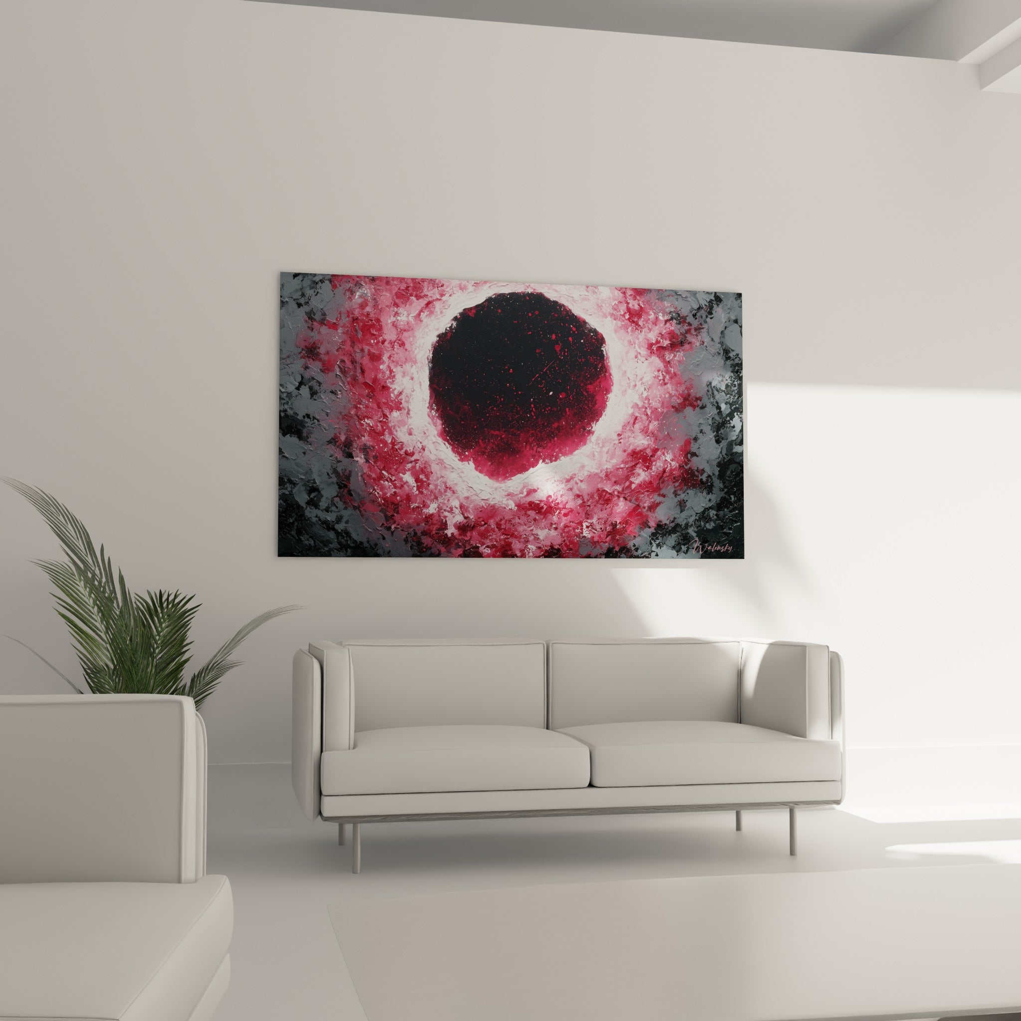 Cercle sombre entouré de rouge vif et blanc éclatant au-dessus d'un canapé dans un salon lumineux