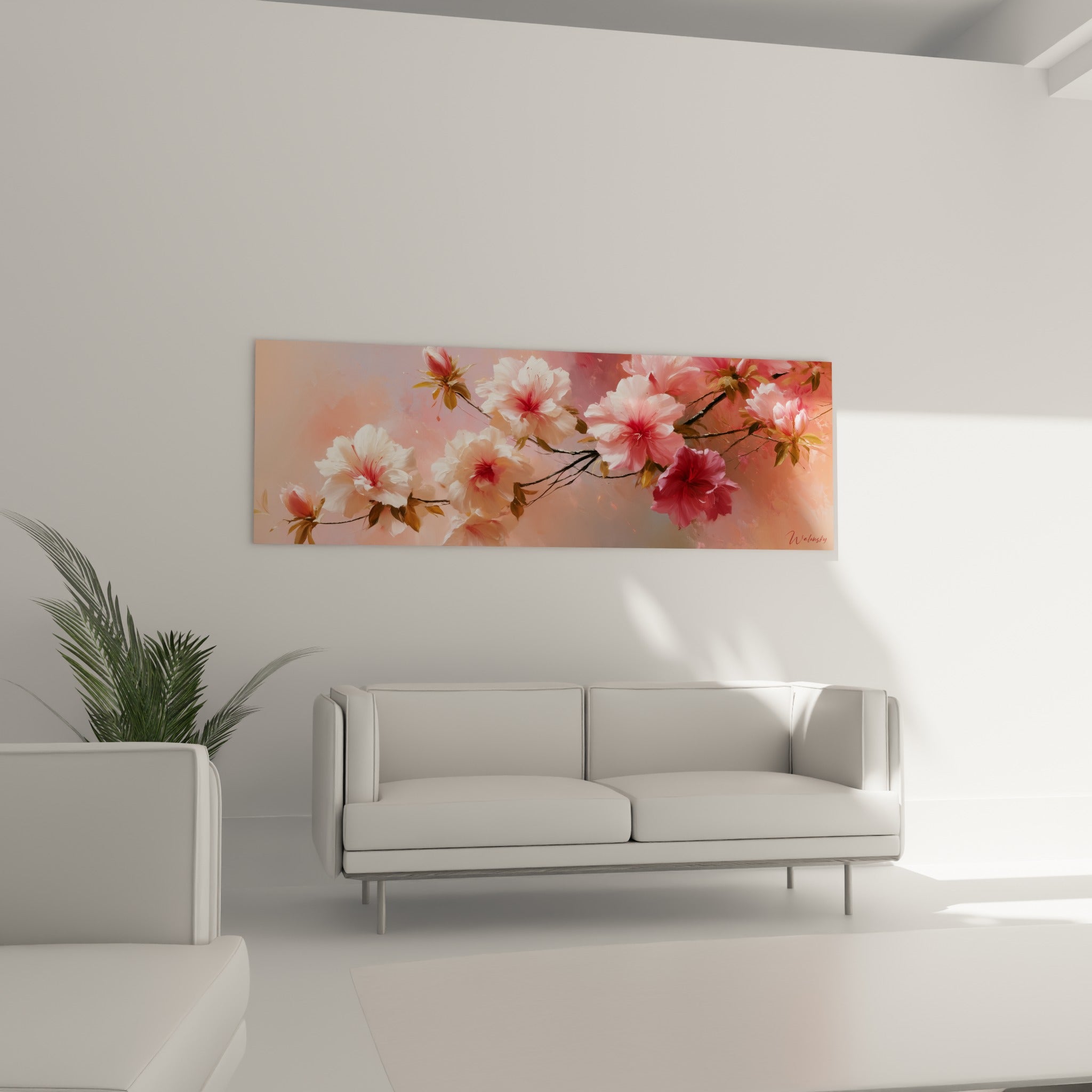 Pétales d'azalées blancs et rose tendre accrochés au-dessus d'un canapé dans un salon lumineux