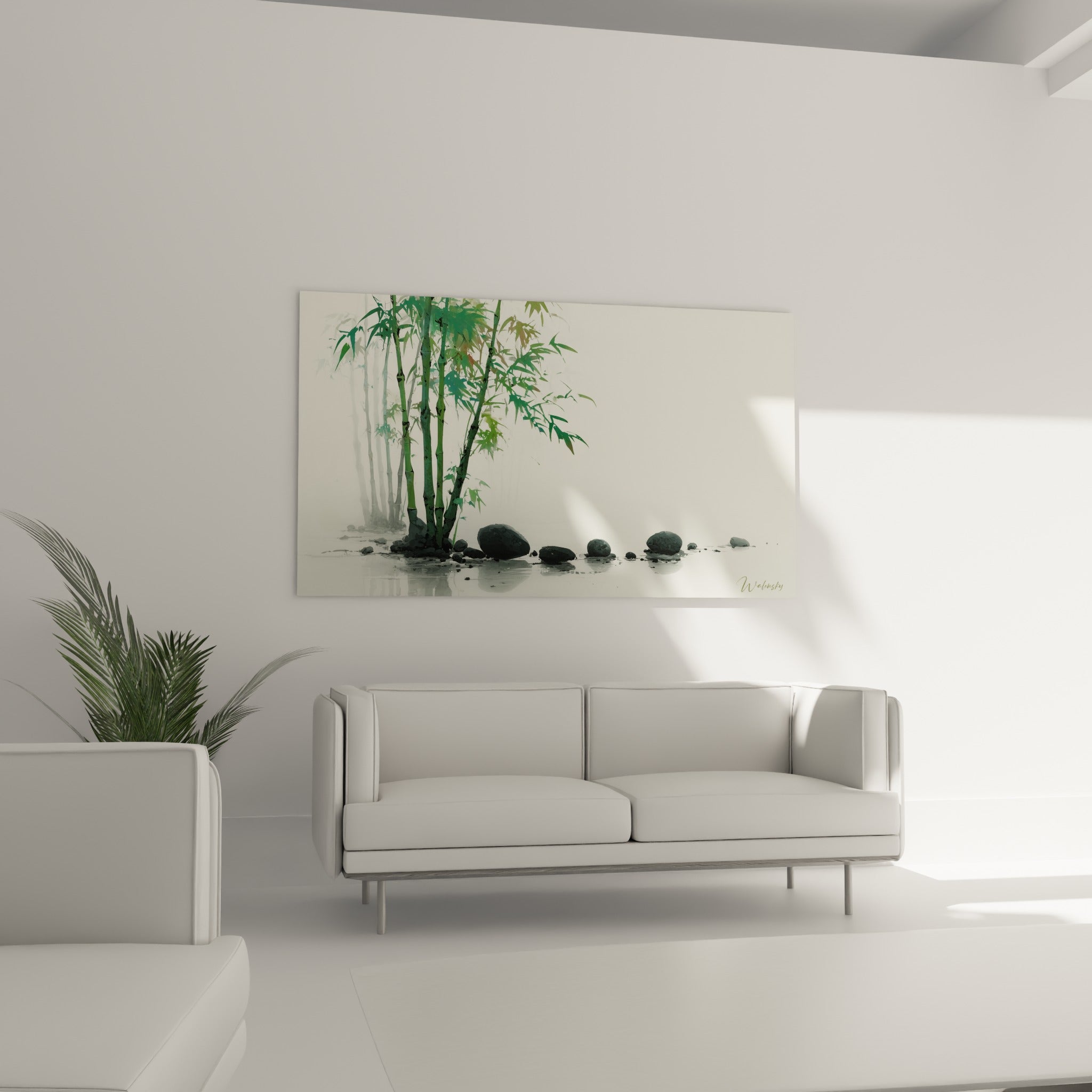 Bouquet de bambou vert et galets anthracite dominent un canapé dans un salon lumineux
