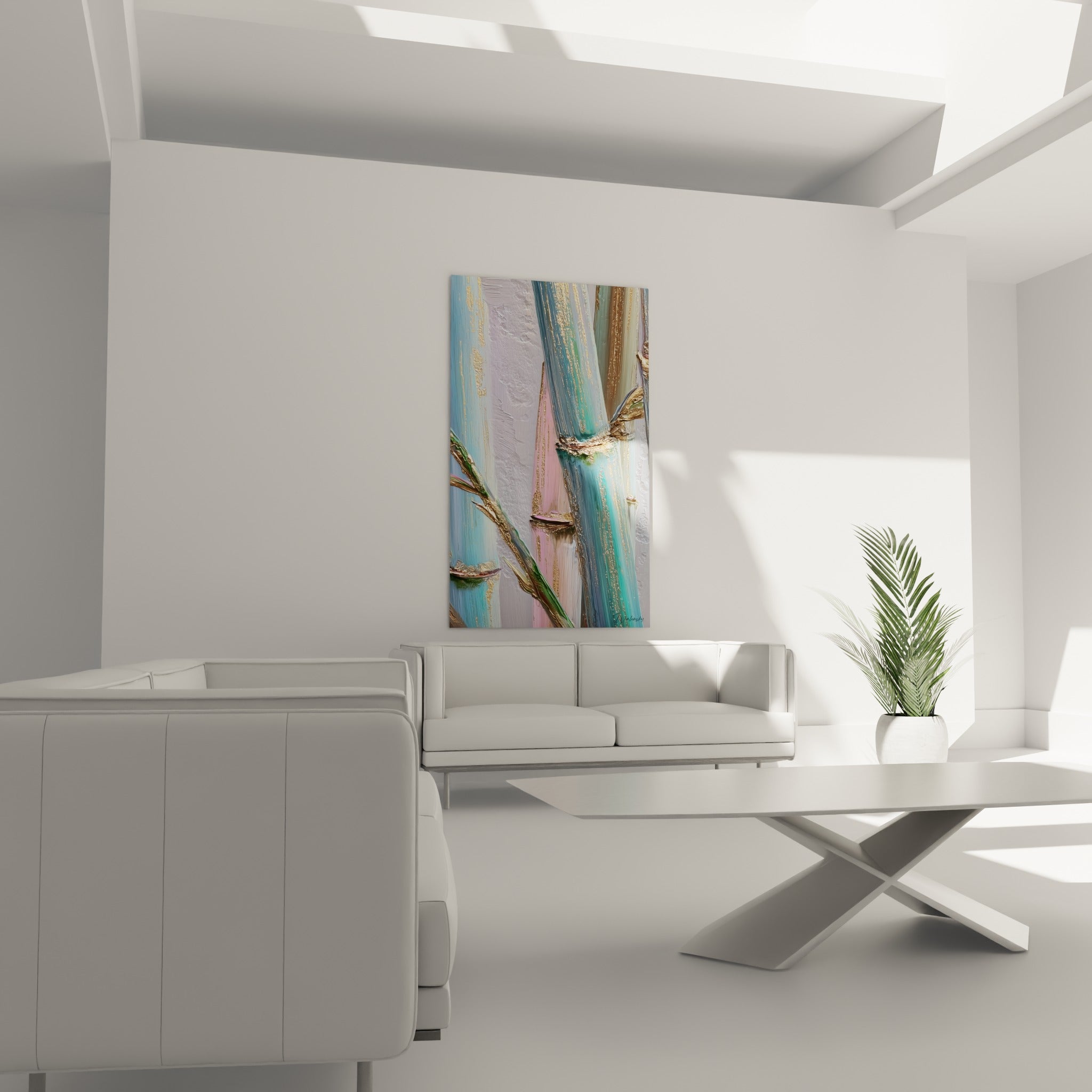 Bambou vert émeraude et rose pastel au-dessus d'un canapé dans un salon lumineux