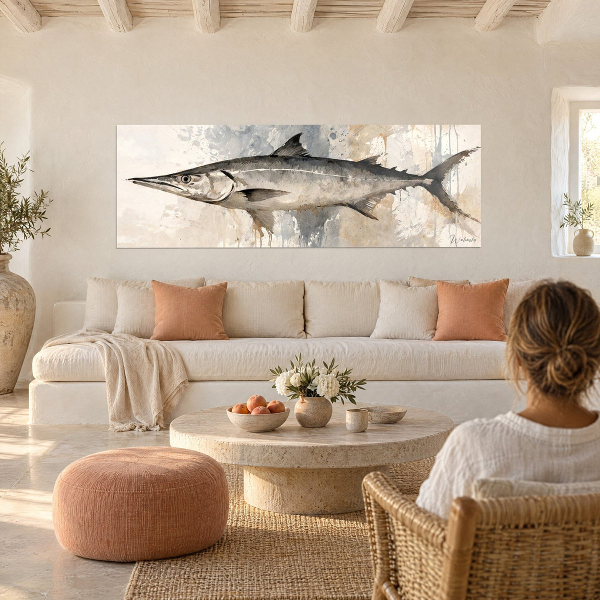 Wall art silver barracuda with a tapered snout, grey and beige, ochre drips, above a sofa in a bright living room