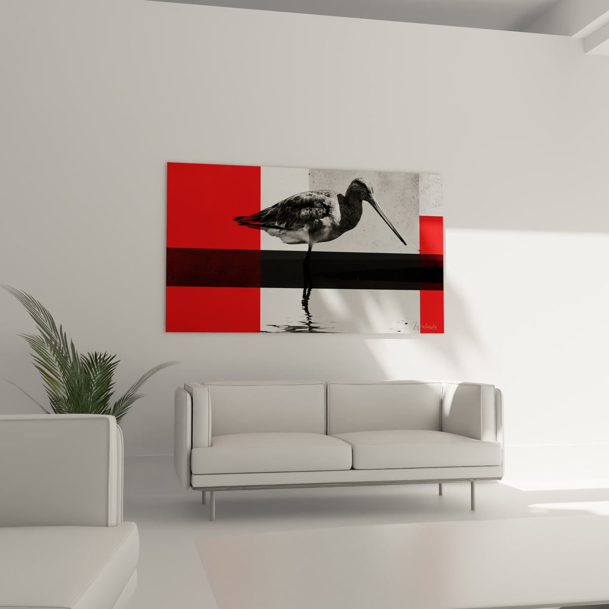 Silhouette de Bécasse en plumage gris tacheté, tableau rouge et blanc au-dessus d'un canapé dans un salon lumineux