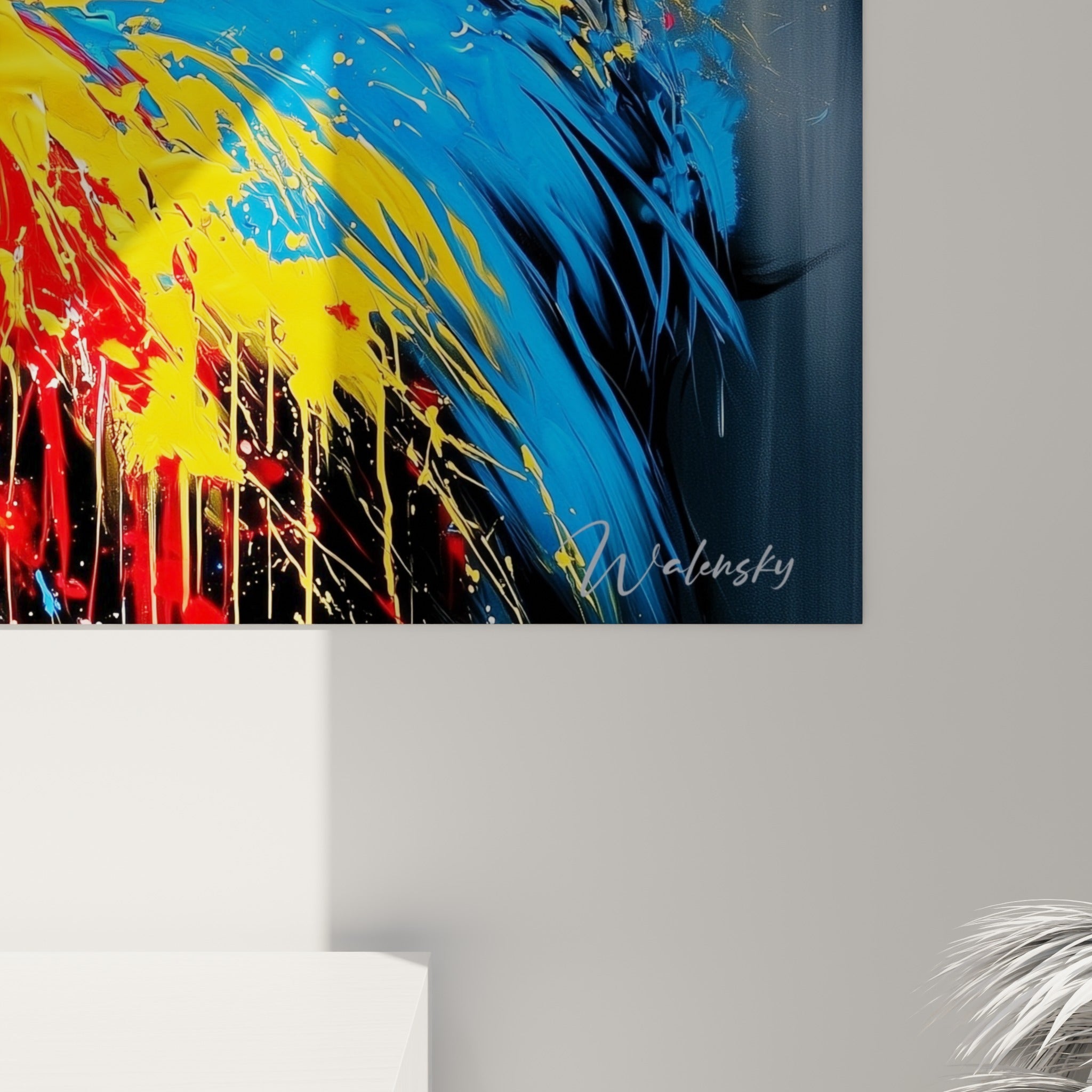 Coulures de peinture rouge et jaune se mêlant sur la texture du Bélier, matière et grain visibles de près