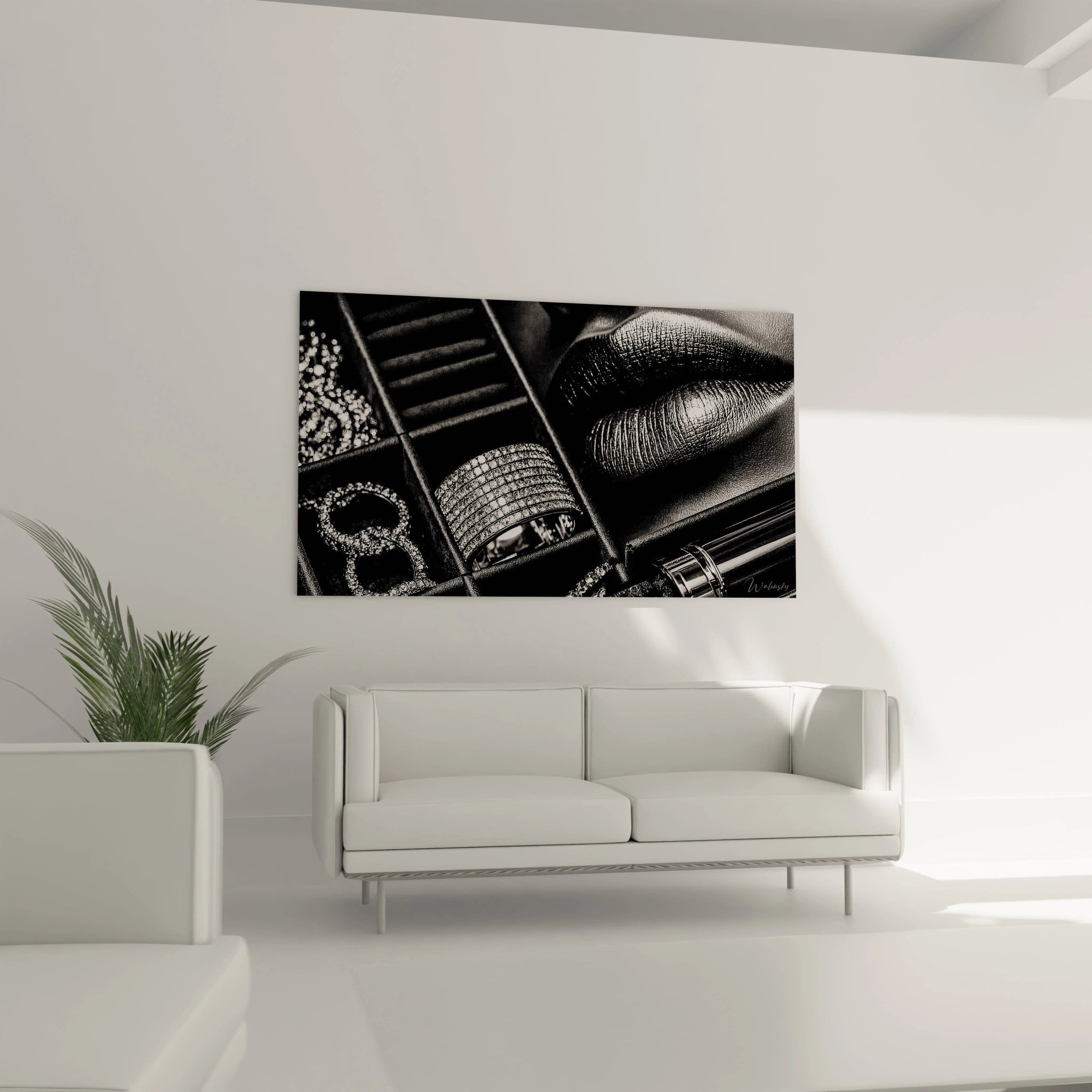 Tableau bijoux noir et blanc sur un mur moderne avec un canapé blanc élégant