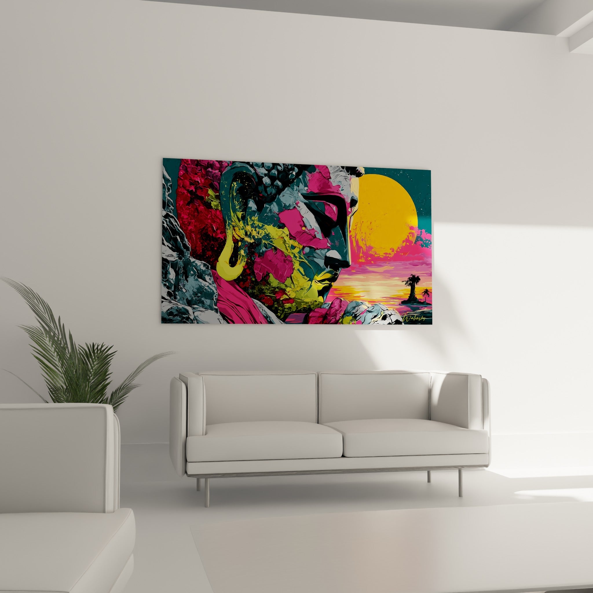 Visage de Bouddha anthracite éclaboussé de magenta et jaune citron, au-dessus d'un canapé dans un salon lumineux