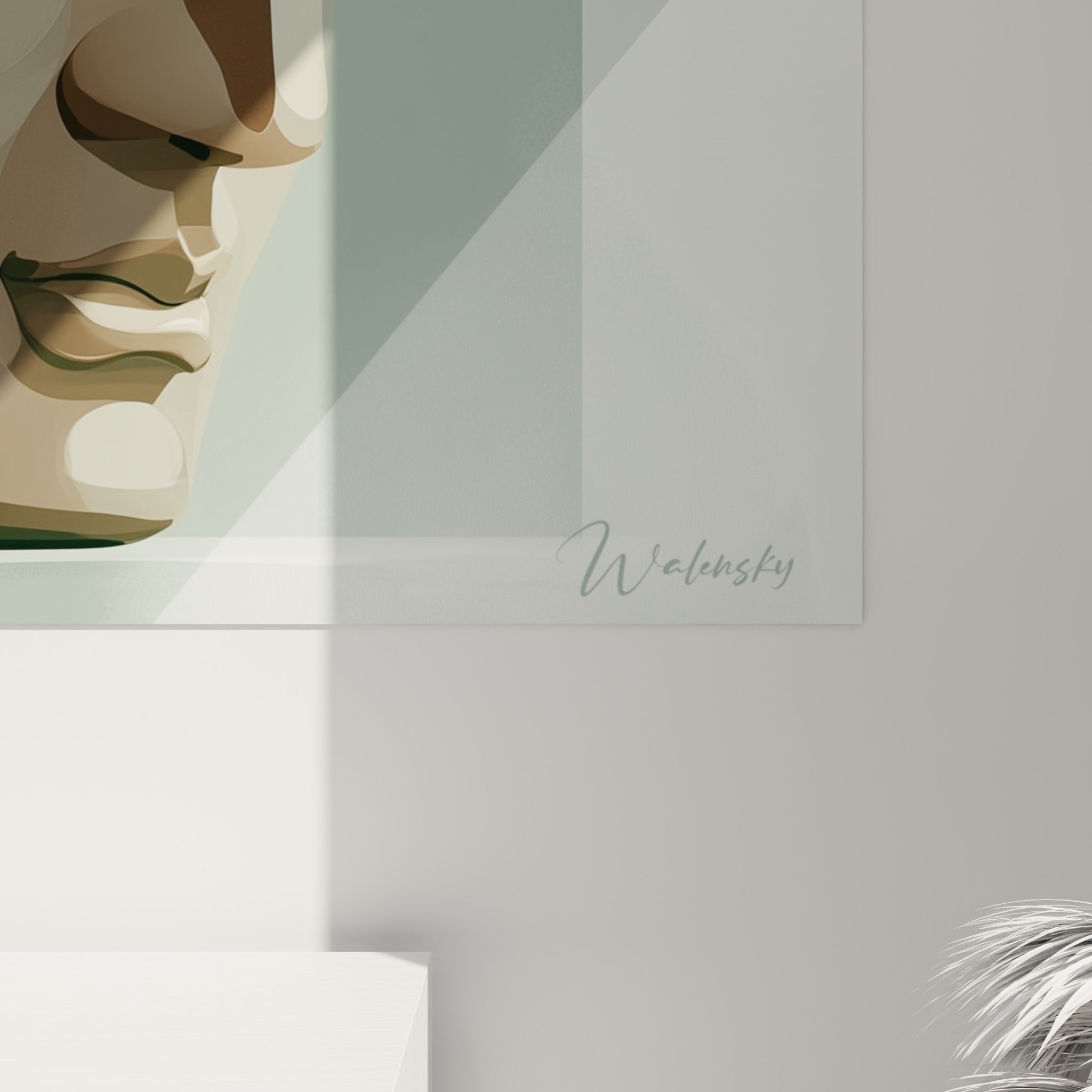 Détail du visage de Bouddha révélant les nuances beige, brun et vert sauge de la surface peinte