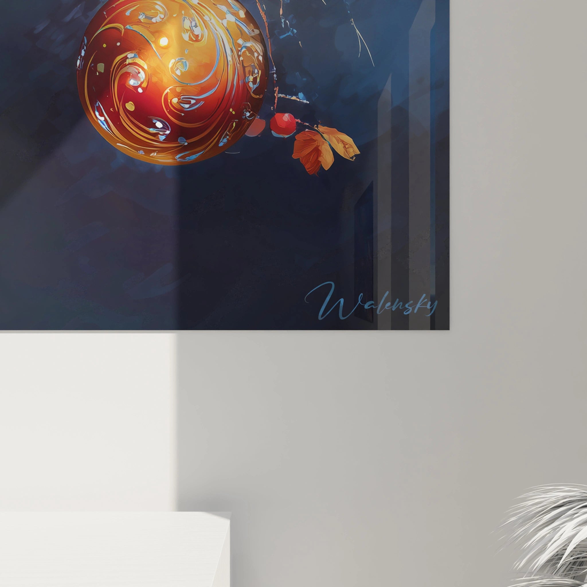 Tableau décoration Noël avec une boule colorée et des feuilles pour une ambiance festive