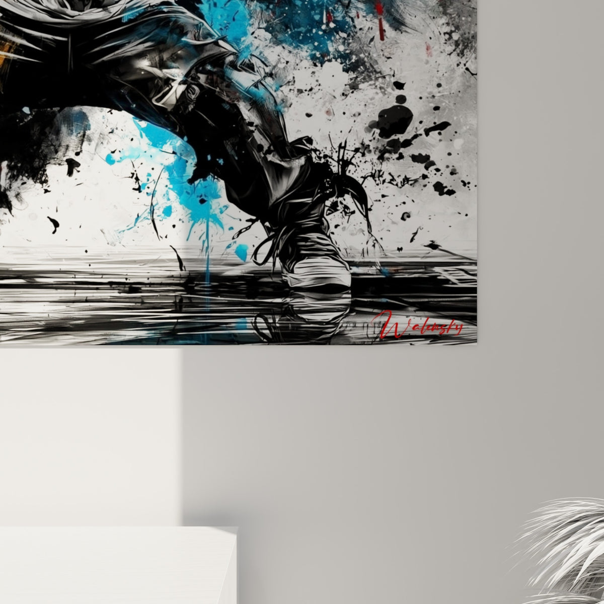Empâtements de peinture rouge et bleue visibles en gros plan sur la toile du tableau breakdance