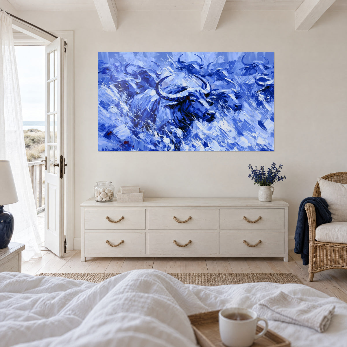 Wall art massive bovine with curved horns, royal blue and icy white strokes, above a bed in a light bedroom