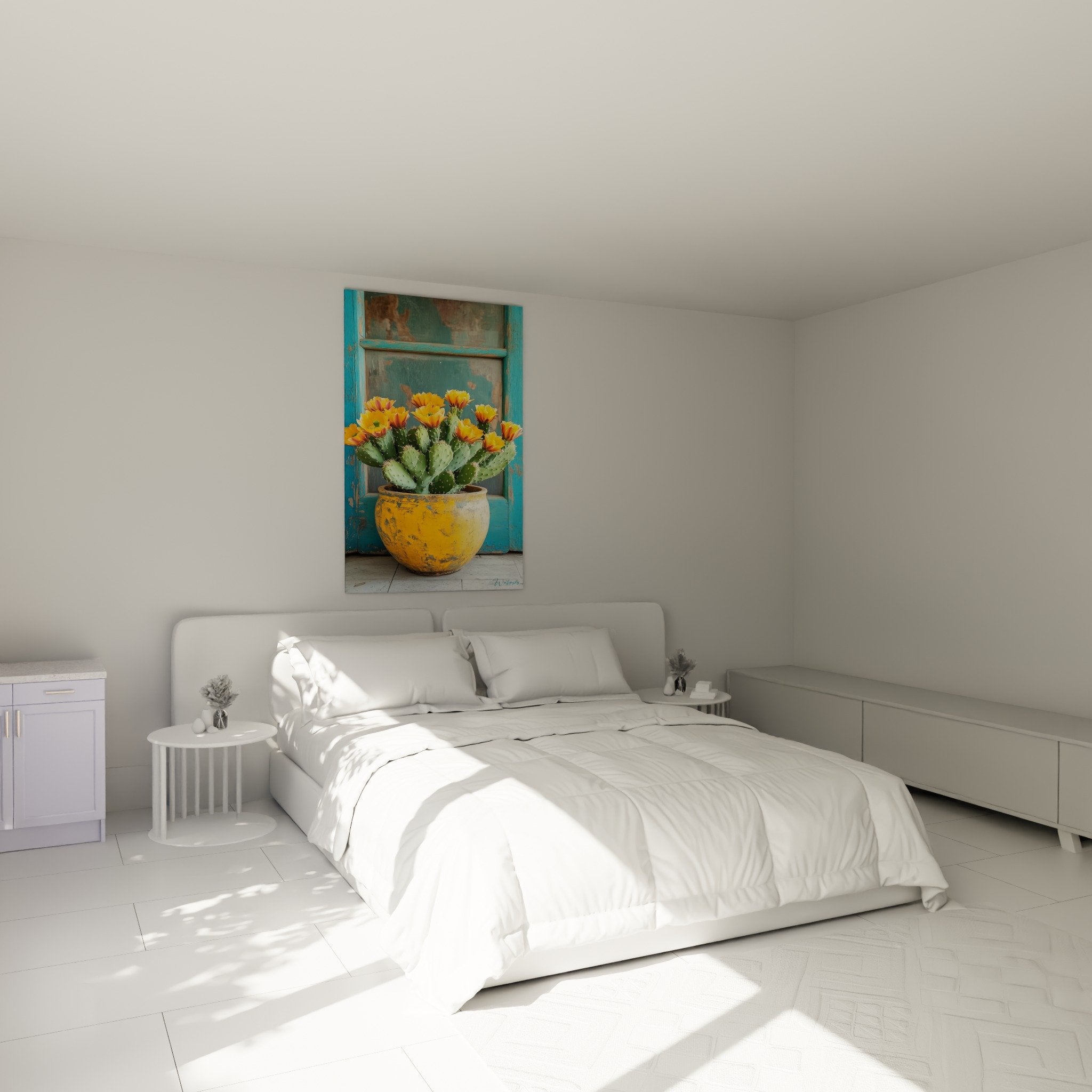 Tableau cactus fleuri orange et jaune dans chambre moderne avec murs blancs et décoration naturelle