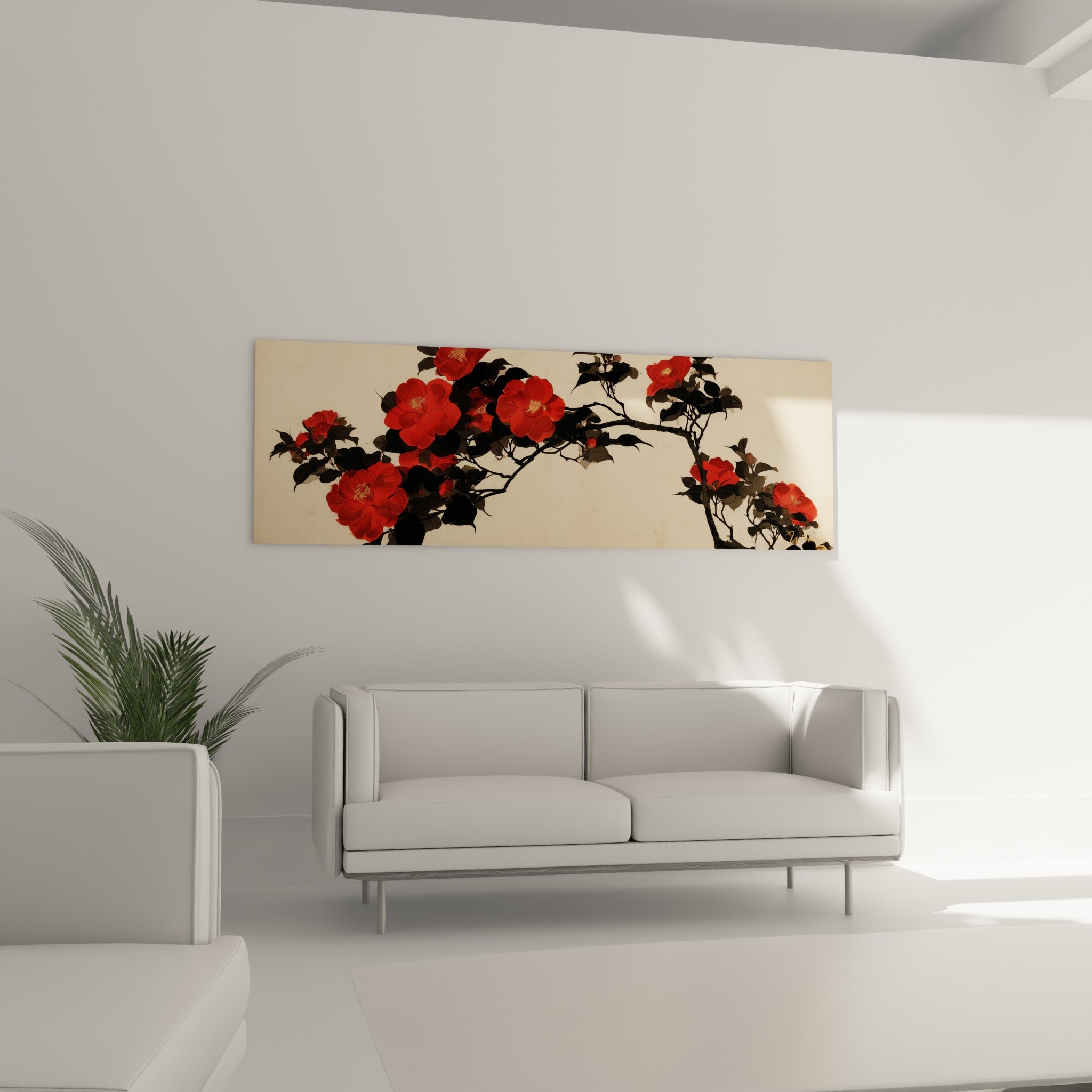 Branche fleurie de camélia rouge et ivoire, au-dessus d'un canapé dans un salon lumineux