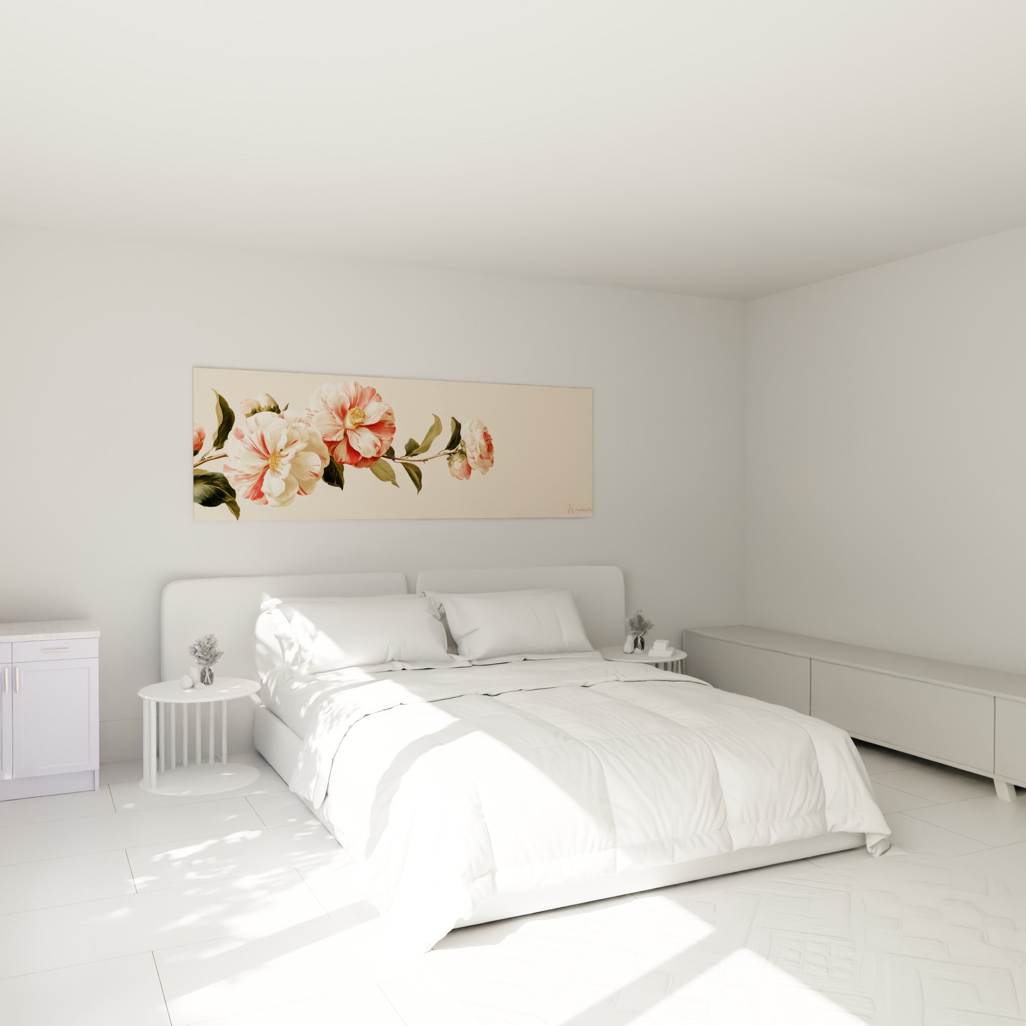 Branche de camélias roses et blancs accrochée au-dessus d'un lit dans une chambre claire