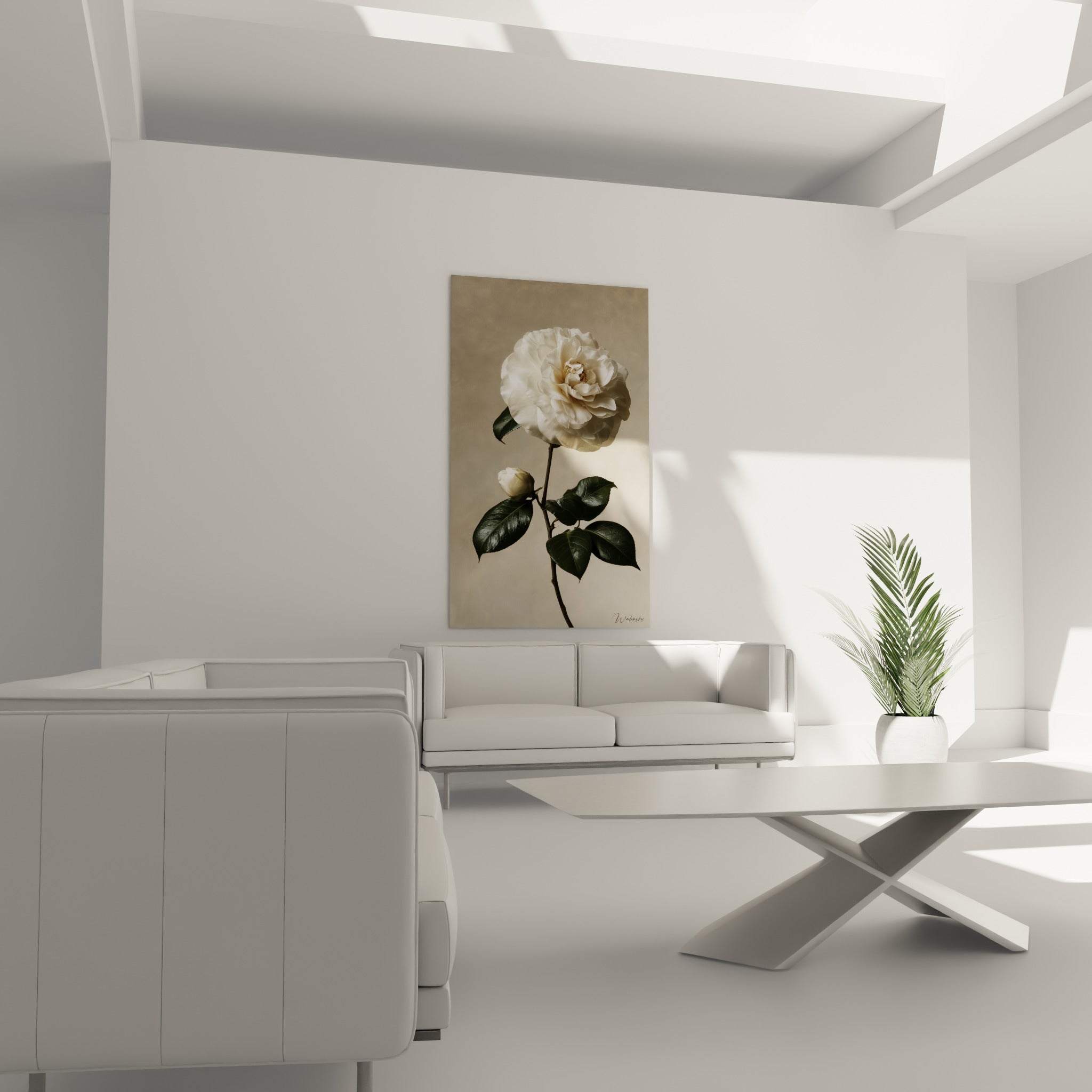 Bouton et fleur de camélia blanc aux feuilles luisantes au-dessus d'un canapé dans un salon lumineux