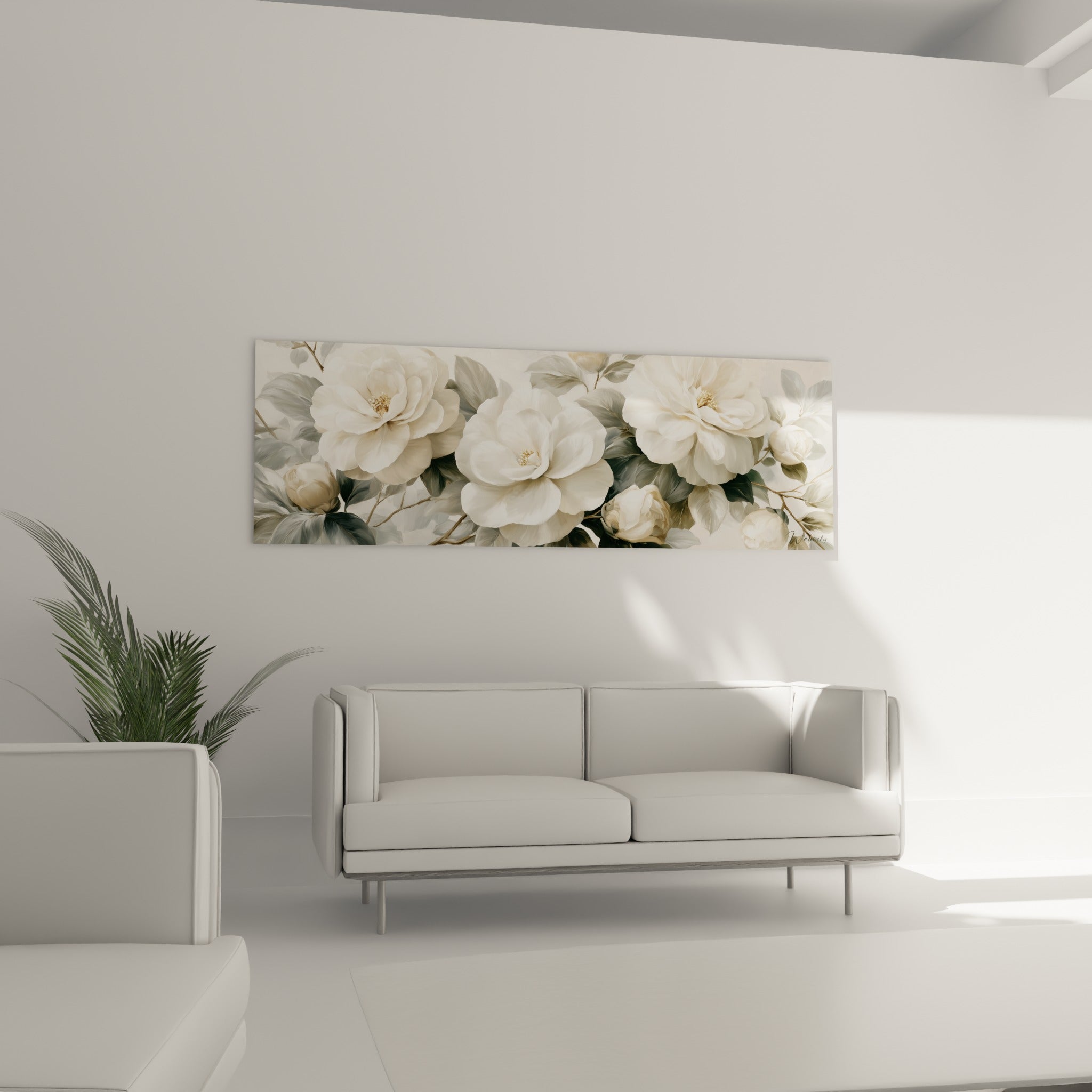 Fleurs de camélia ivoire et gris sauge au-dessus d'un canapé dans un salon lumineux