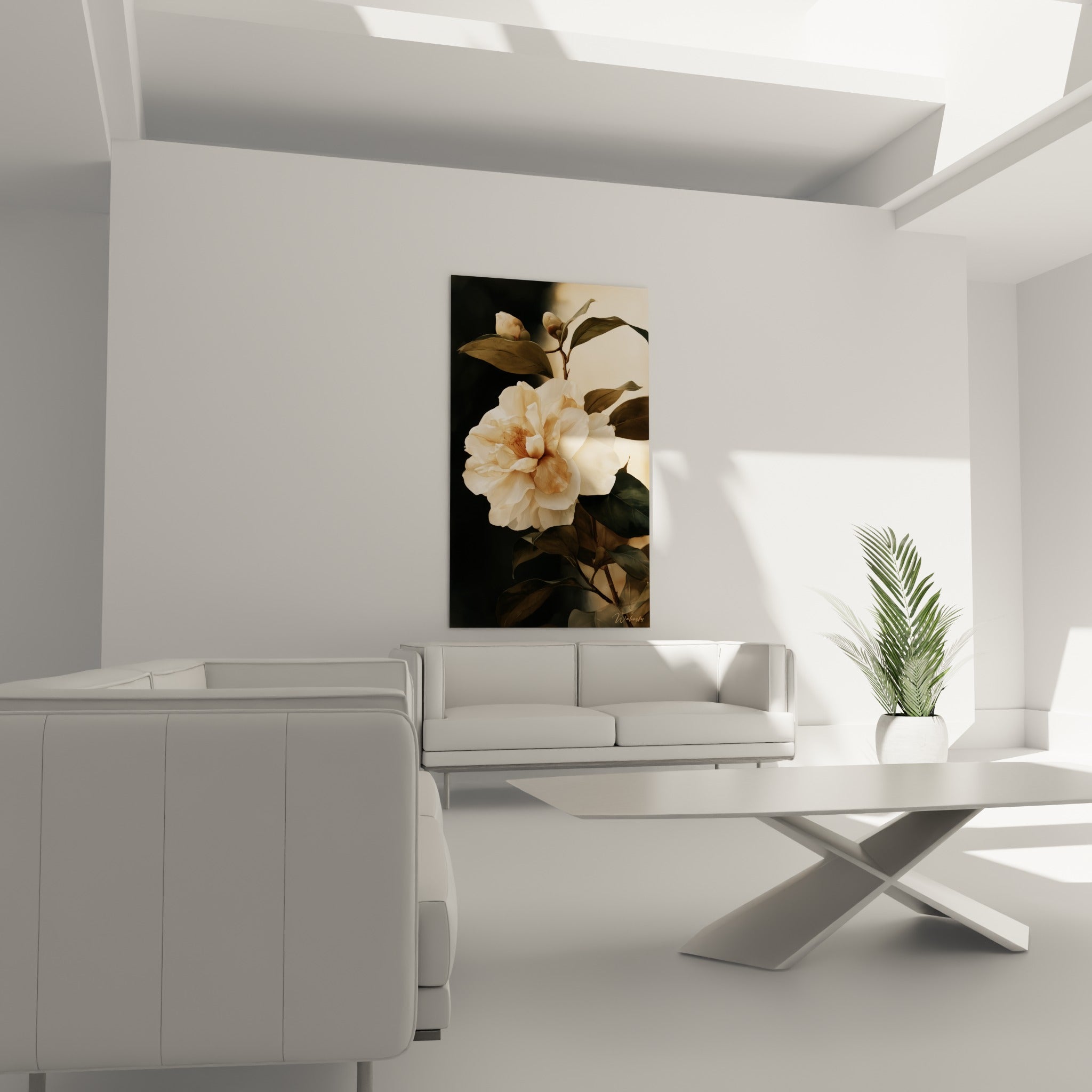 Pétales crème et feuilles vertes du camélia disposés au-dessus d'un canapé dans un salon lumineux.