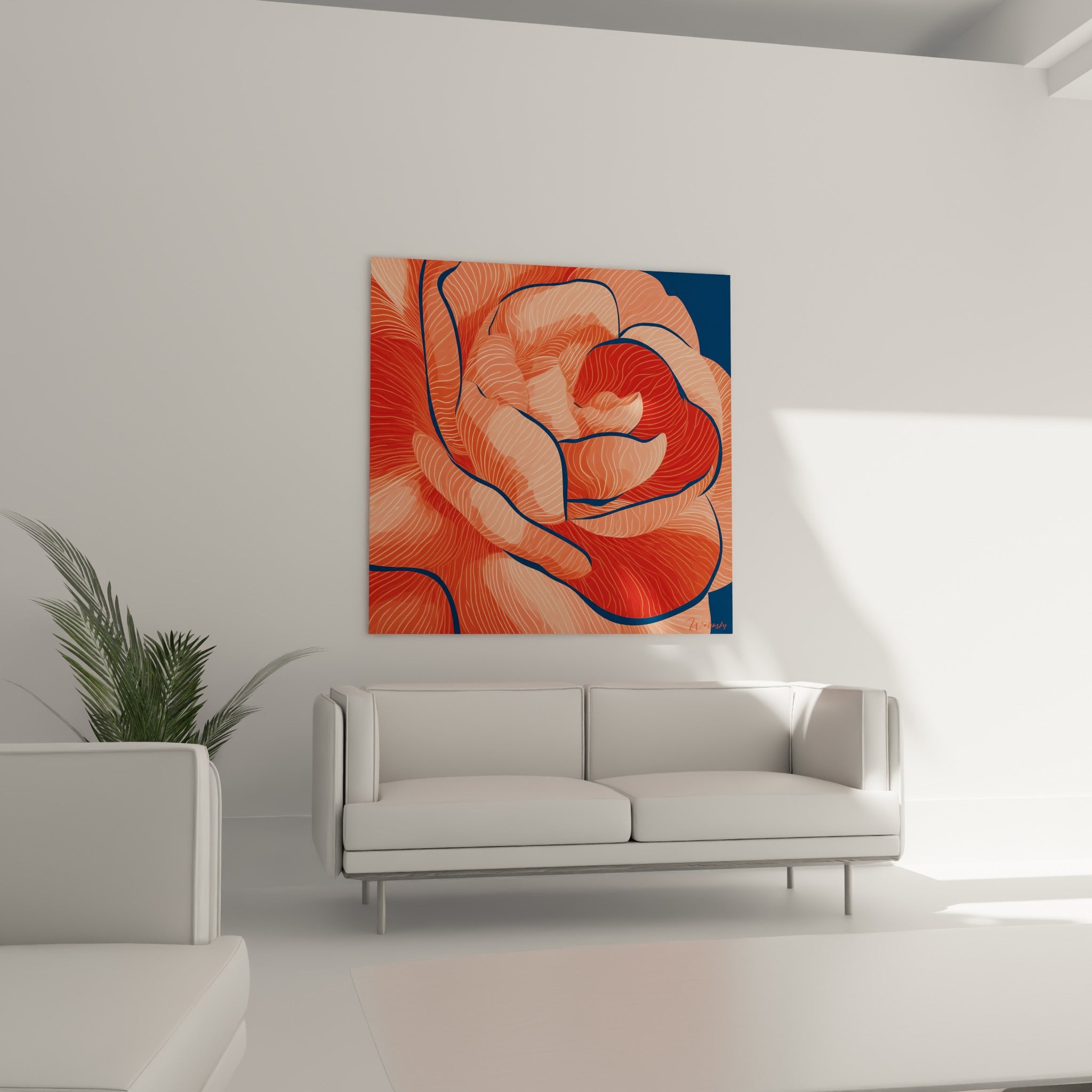 Fleur de camélia corail et rouge brique aux lignes fines crème, au-dessus d'un canapé dans un salon lumineux
