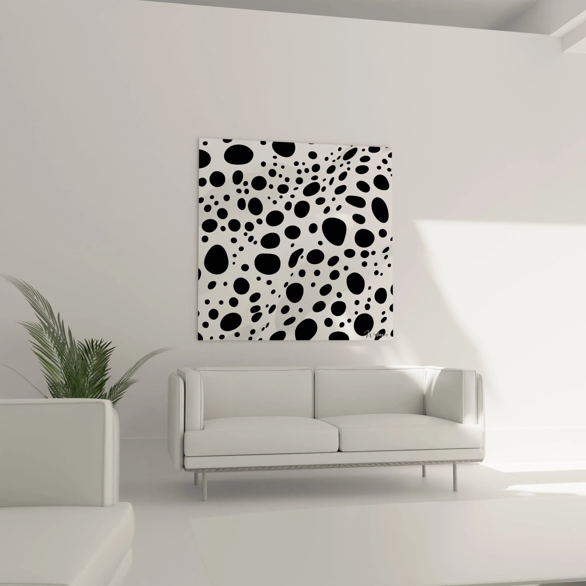 Tableau tacheté noir et blanc de Walensky accroché sur un mur blanc dans un salon moderne