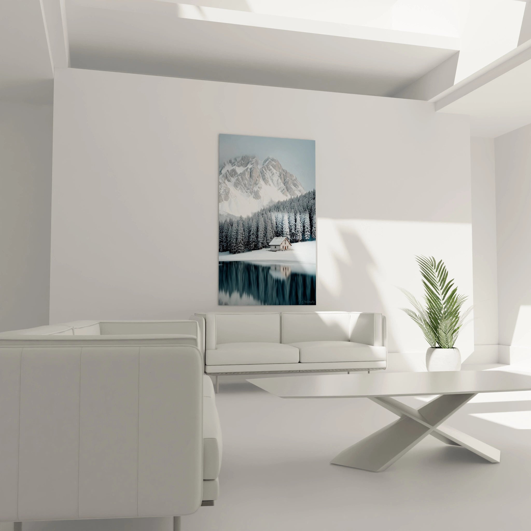 tableau chalet bois authentique accroché dans salon blanc minimaliste avec canapé, table basse, plante et paysage montagne