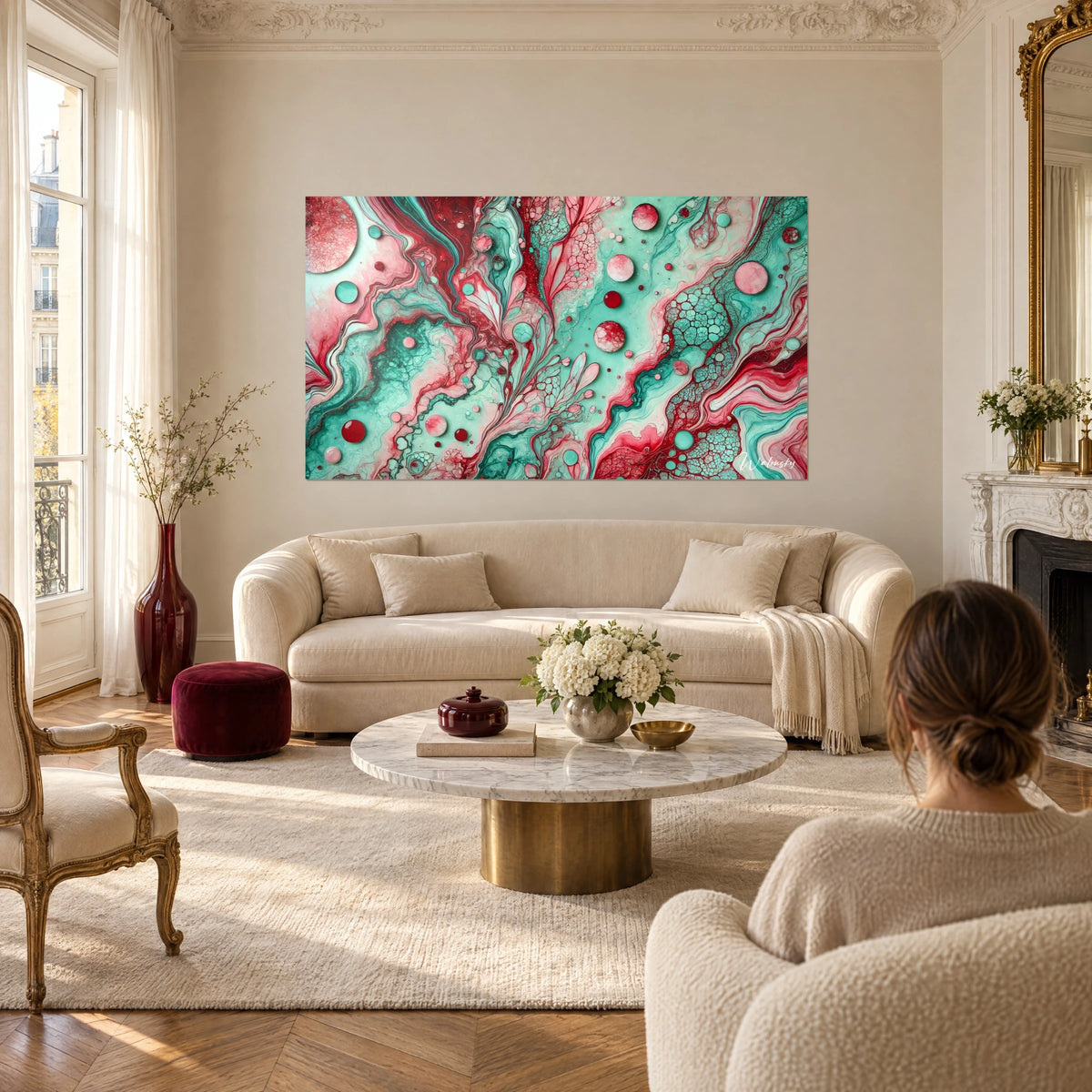 Wall art fluid painting marbled in turquoise and ruby red, lace-like cells and pink bubbles, above a sofa in a bright living room