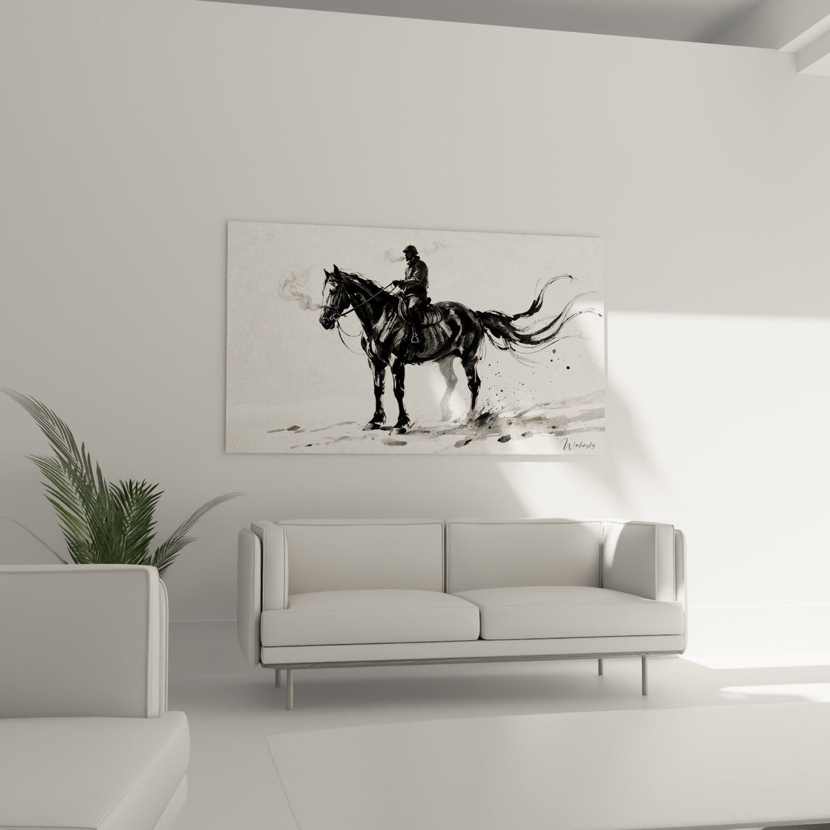 Silhouette équestre en encre noire et gris cendré, accrochée au-dessus d'un canapé dans un salon lumineux