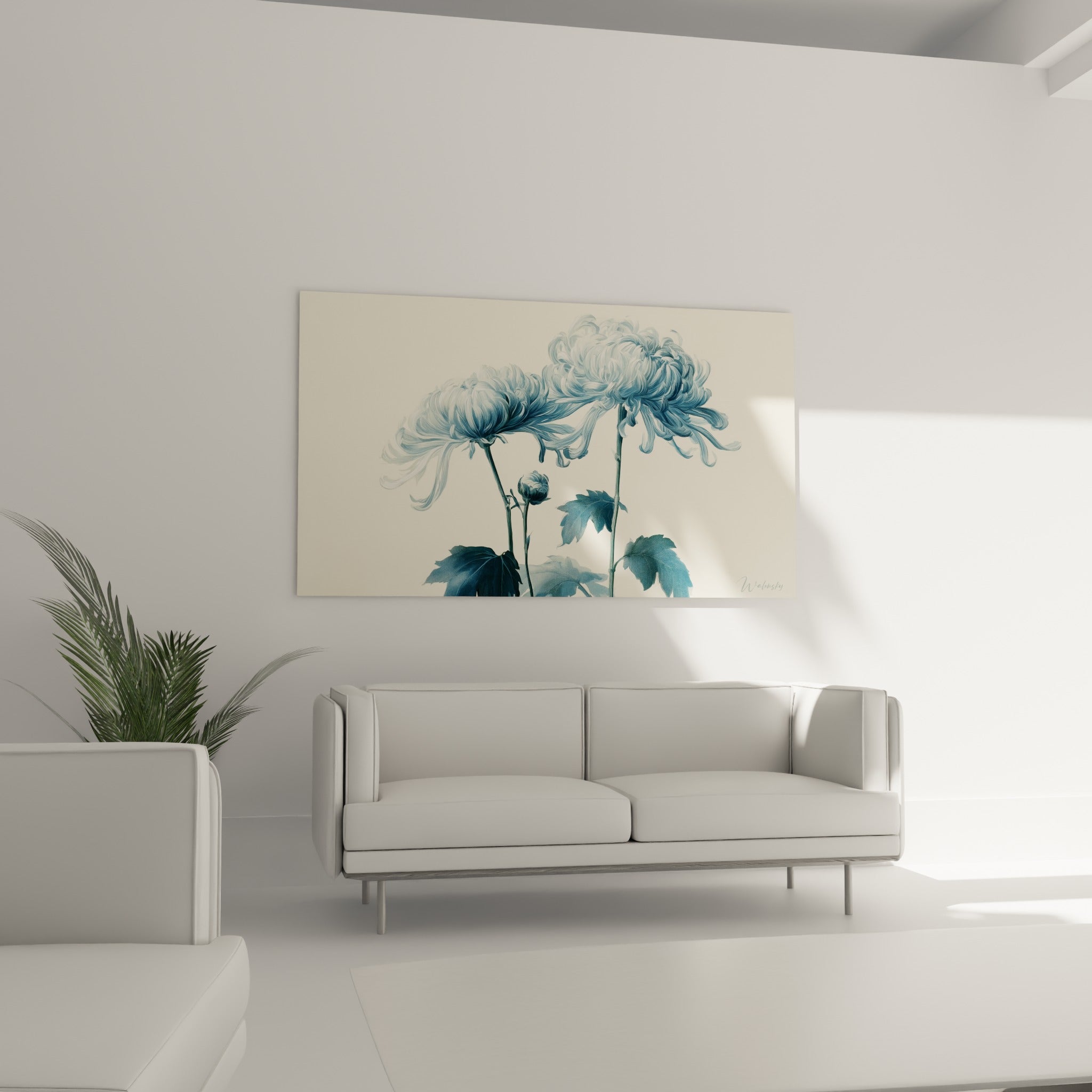 Chrysanthème bleu pastel et feuilles anthracite au-dessus d'un canapé dans un salon lumineux