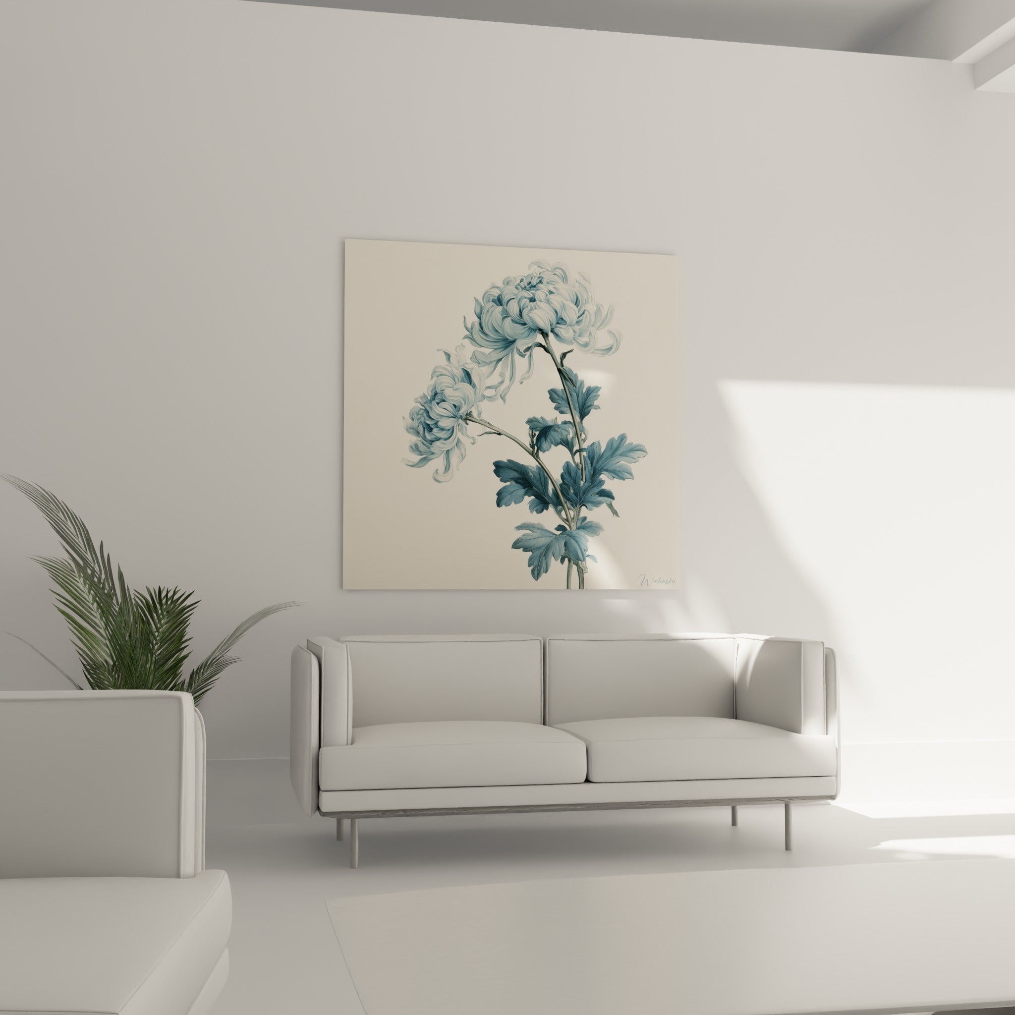 Chrysanthème pastel aux feuilles bleu anthracite installé au-dessus d'un canapé dans un salon lumineux