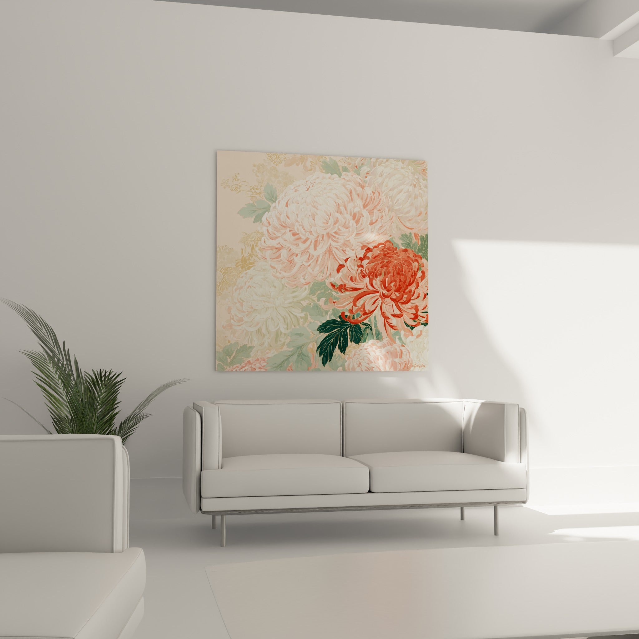 Fleurs de chrysanthème blanches et corail suspendues au-dessus d'un canapé dans un salon lumineux